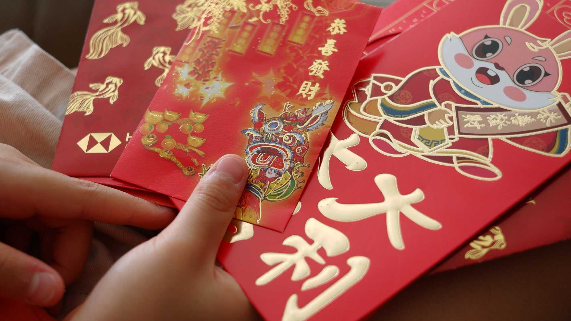 One reader argues that parents can help their children learn the value of money by taking charge of their red packets. Photo: Shutterstock
