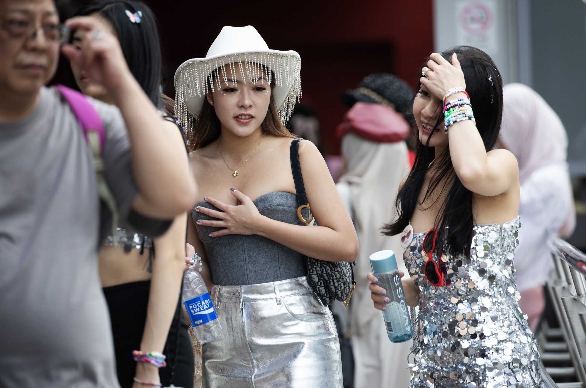 Taylor Swift fans queue to enter the National Stadium in Singapore on the first day of her concert in the city state. Photo: EPA-EFE