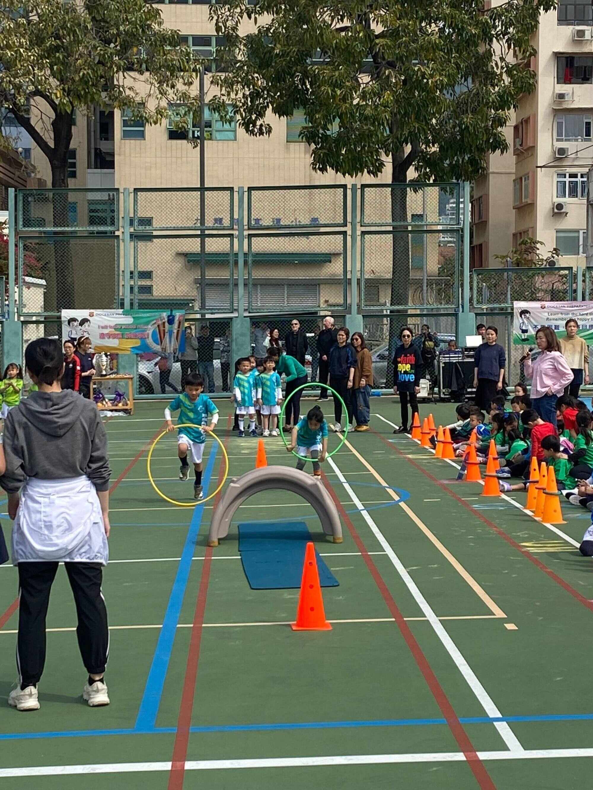 Abby and her teammates cheered on their classmates during the relay race. Photo: Handout
