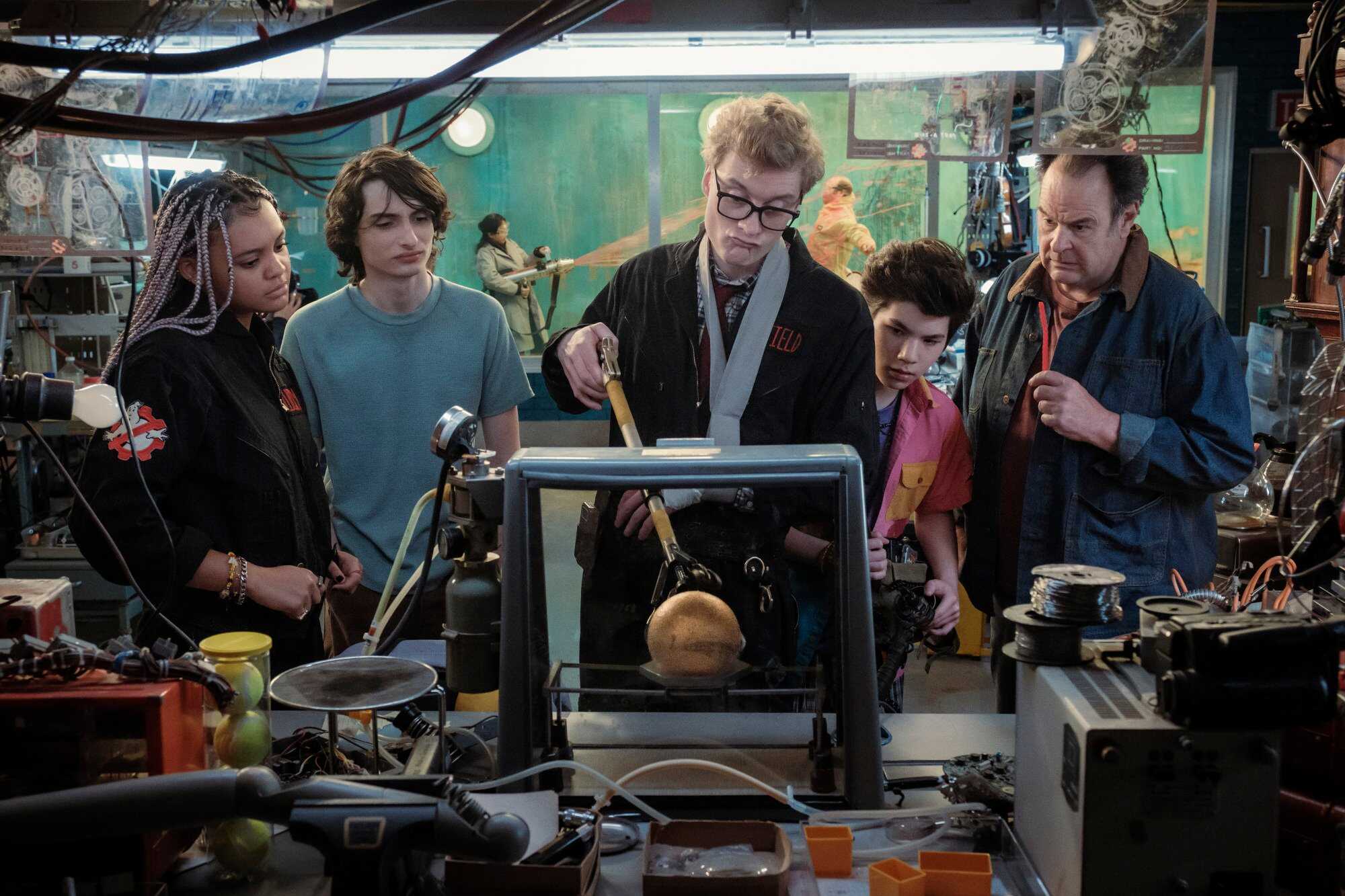 This image released by Columbia Pictures shows, from left, Celeste O’Connor, Finn Wolfhard, James Acaster, Logan Kim and Dan Aykroyd in a scene from “Ghostbusters: Frozen Empire.” Photo: Sony via AP