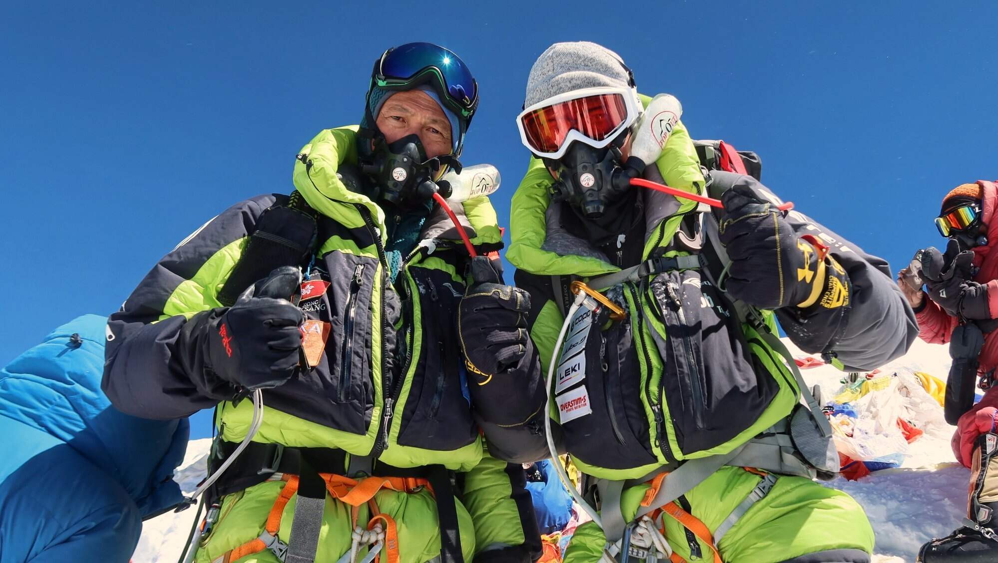 Bob Tsang (right) and his father, John Tsang, on the summit of Mount Everest. Photo: Handout