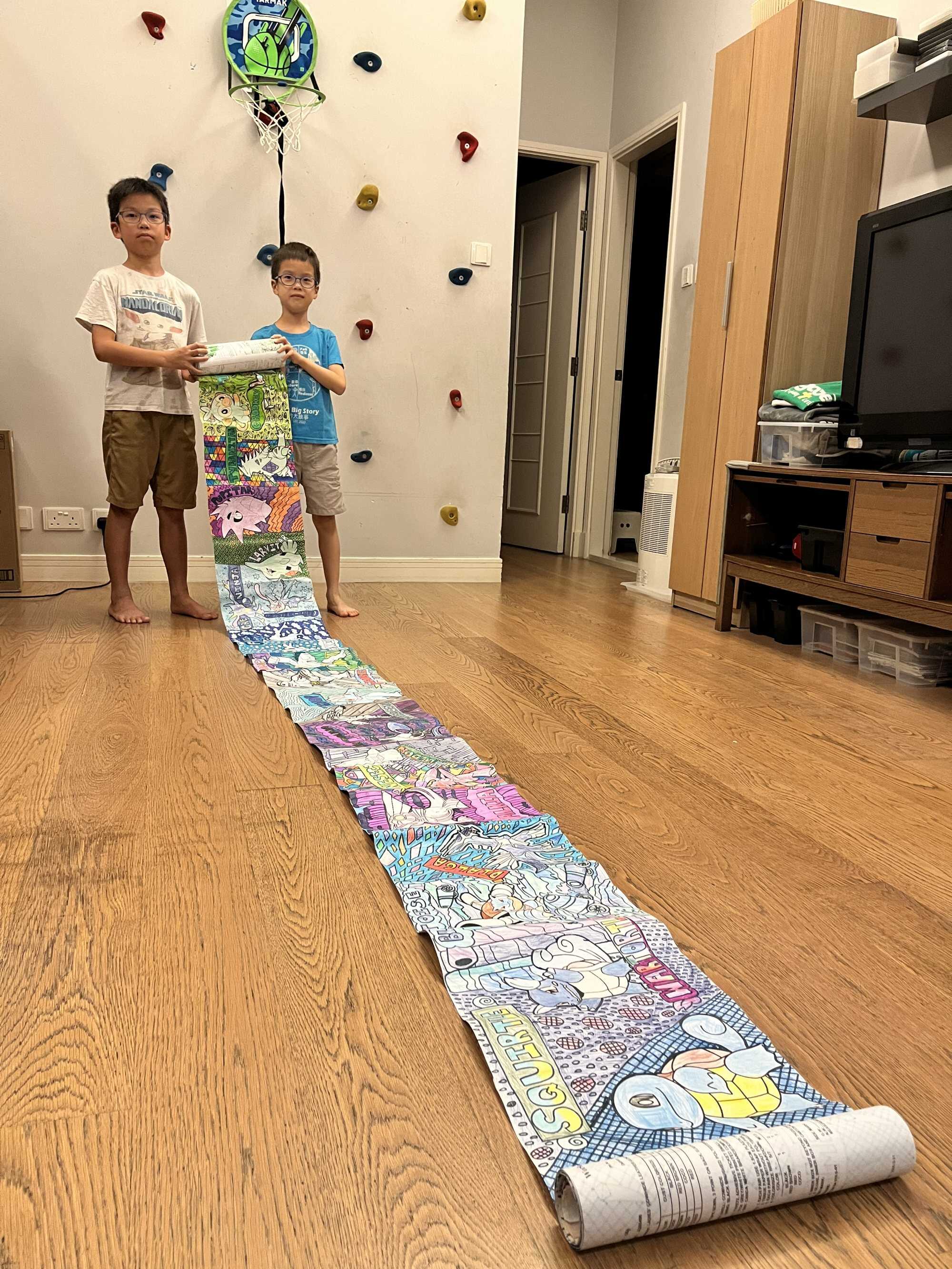 Joey and Onsie Chien have worked very hard on their Pokémon scroll! Photo: Handout