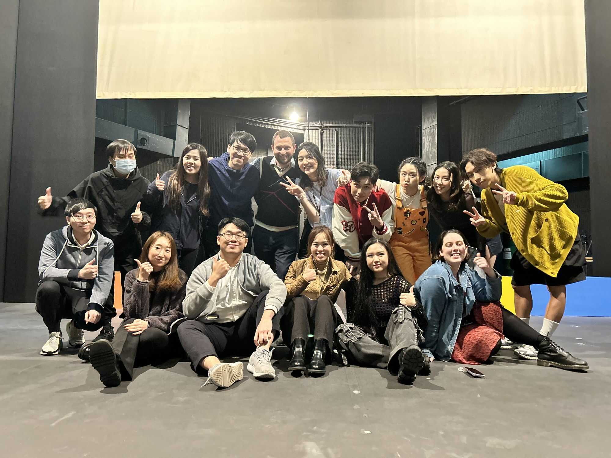 The actors, staff, crew and directors behind the production “All Things at Once” pose on stage after their Friday-night performance. Photo: Kathryn Giordano