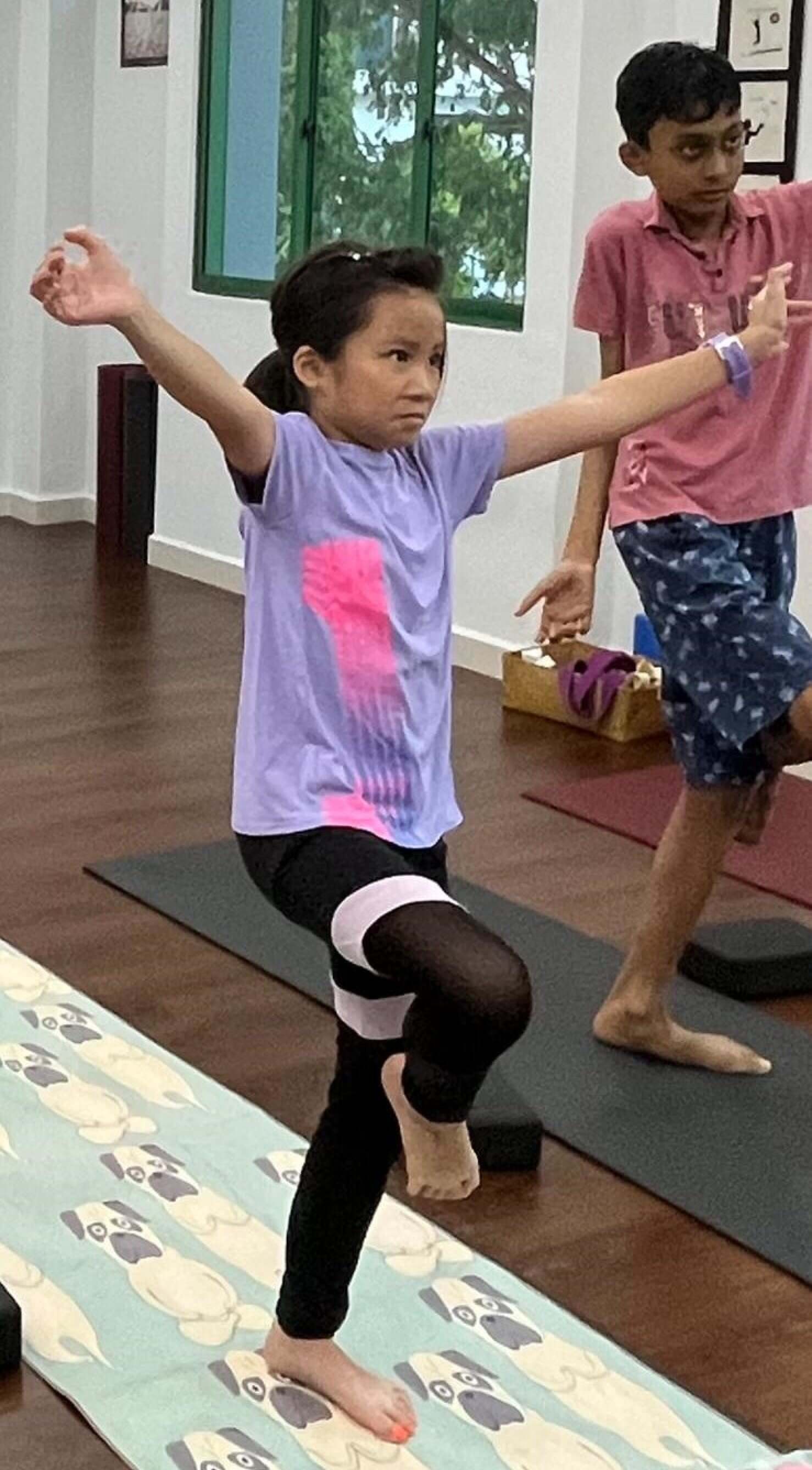 Palm tree pose can help you to focus and feel calm. Photo: Doris Wai
