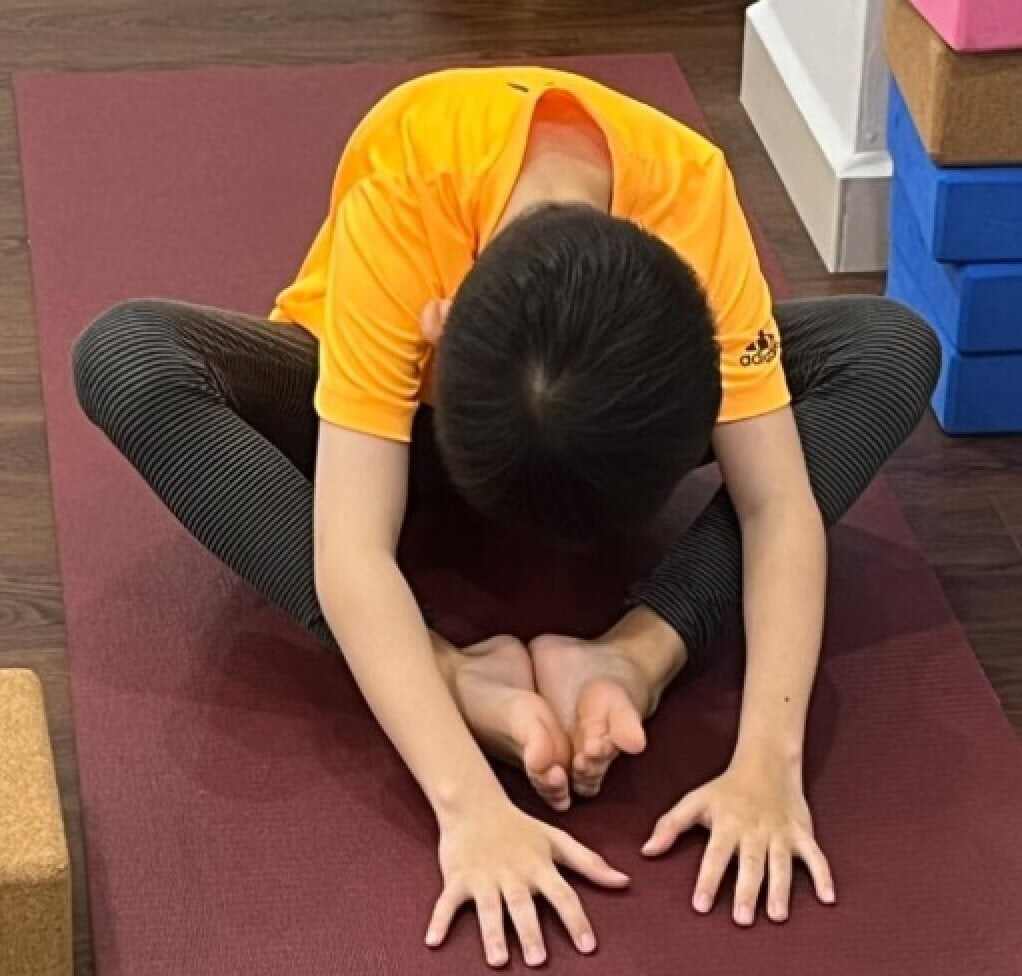 Butterfly pose is great for relaxing your muscles. Photo: Doris Wai