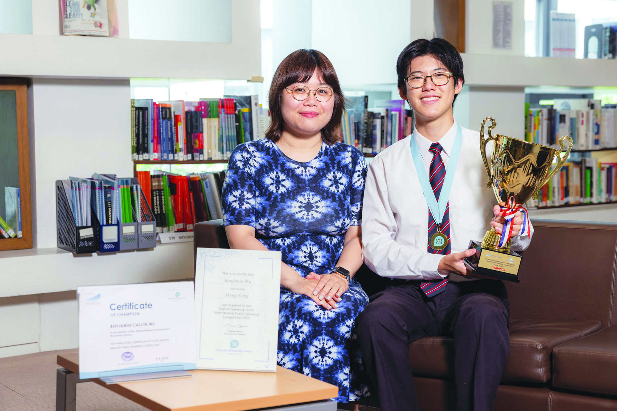 Joan Cho (left), the English public speaking coach at Diocesan Boys’ School, with student Benjamin Wu. Photo: Handout
