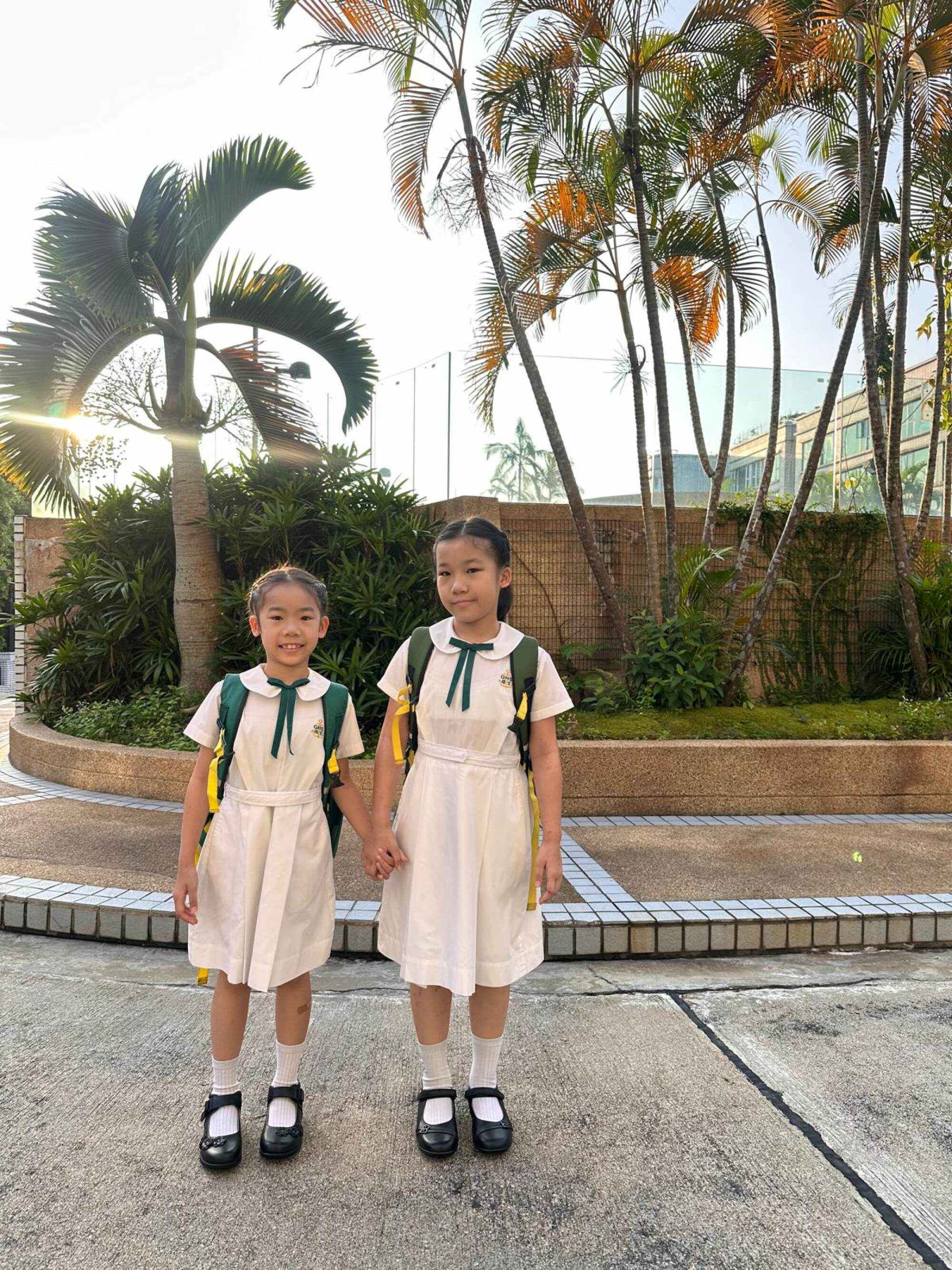 Janice Cheung (right) loves her life at school. Photo: Handout