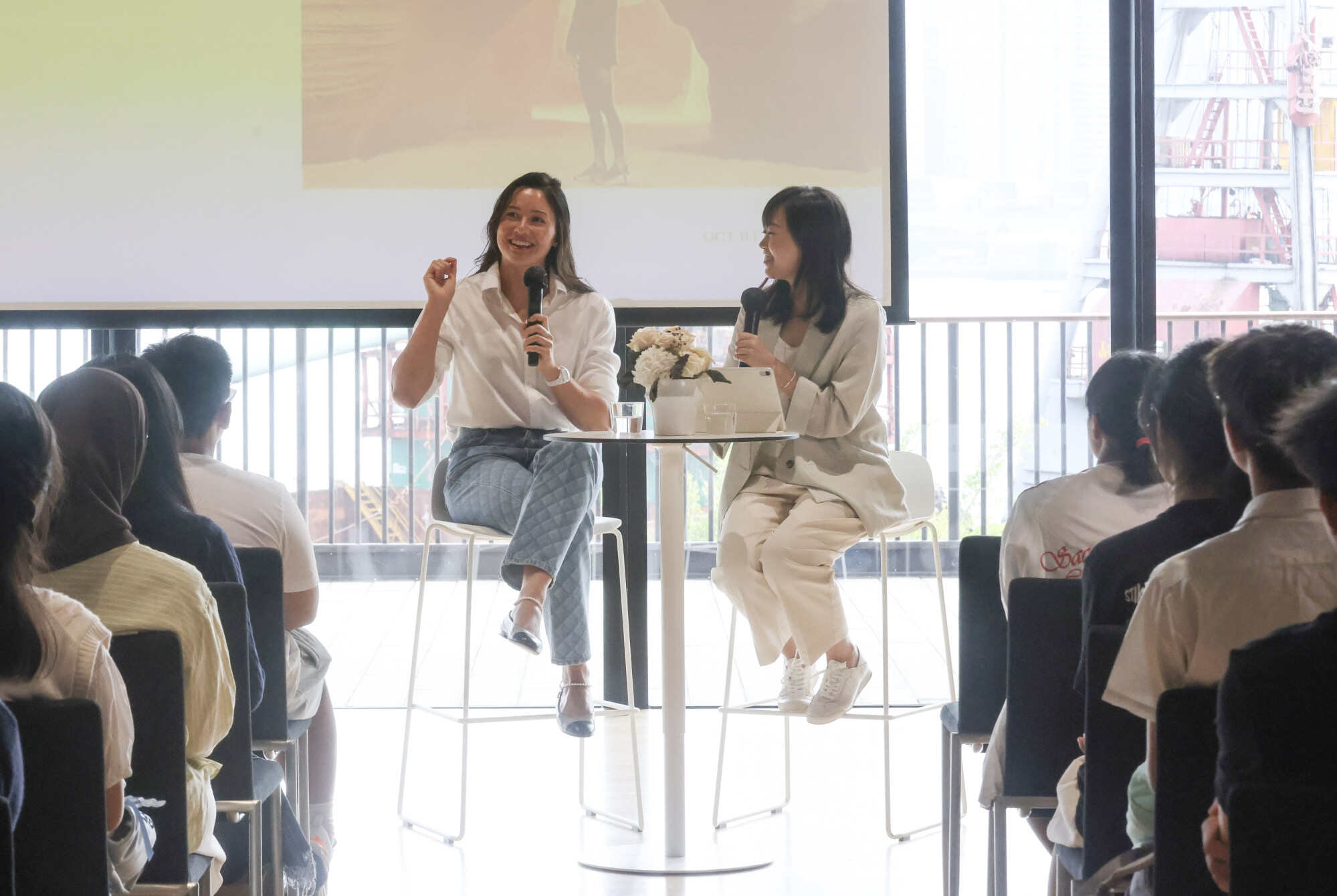 Olympian Siobhan Haughey (left) chatted with Hong Kong students this month in a forum moderated by Young Post’s editor, Emily Tsang (second from left). Photo: Jonathan Wong