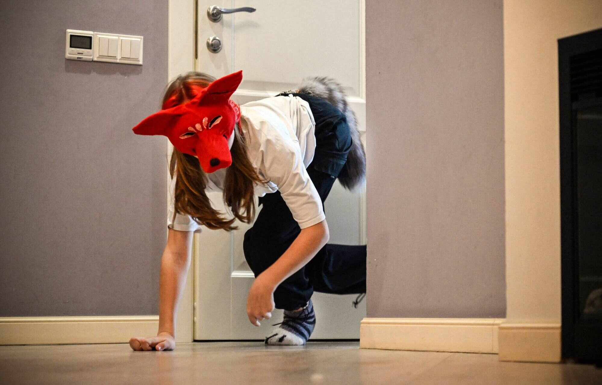 Quadrobics is a fitness and social media trend that involves imitating the movements of four-legged animals. Photo: AFP