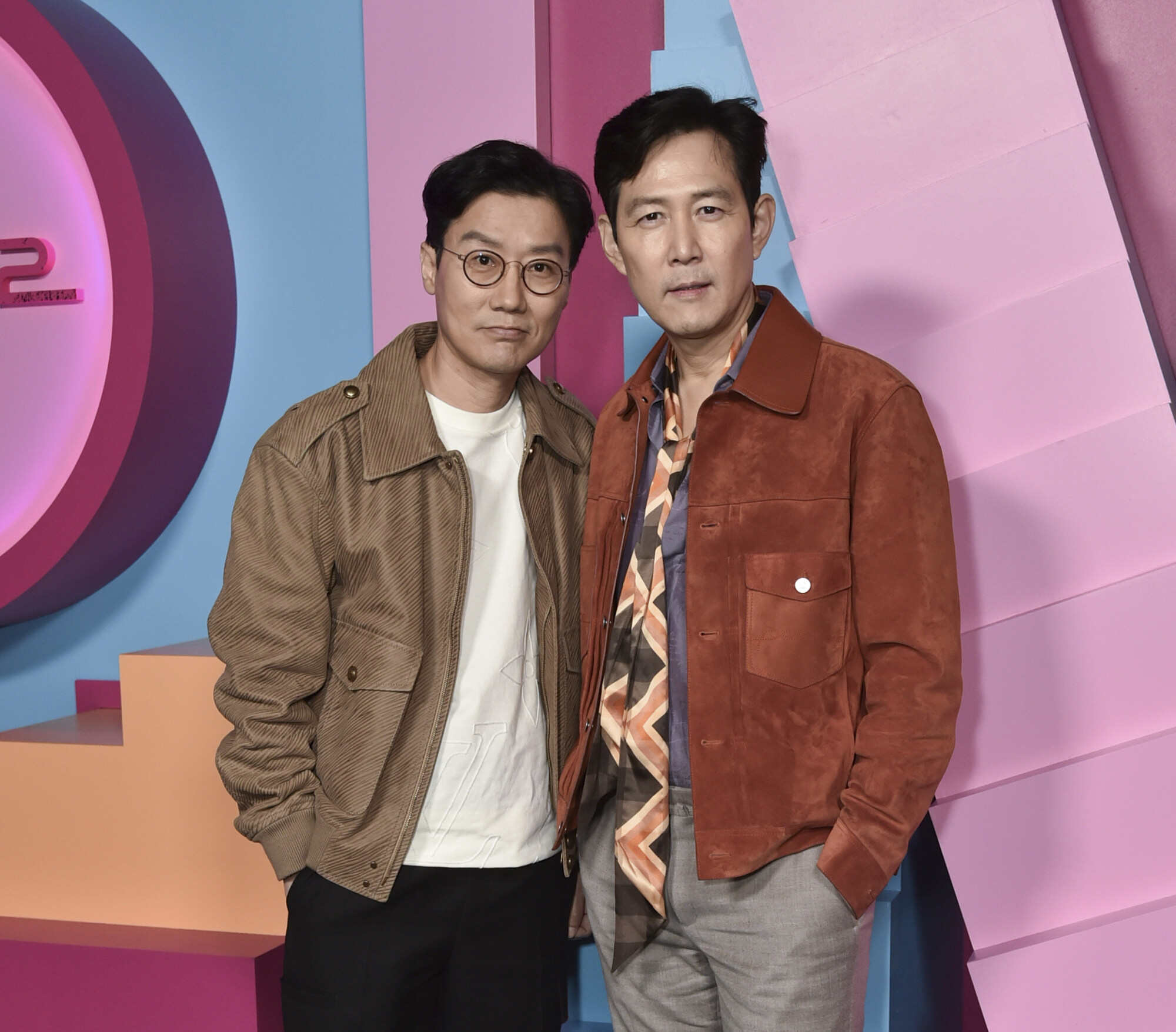 Hwang Dong-hyuk (left) and Lee Jung-jae (right) arrive at an FYC screening for the second season of “Squid Game” at the Netflix Tudum Theater in Los Angeles, United States. Photo: Richard Shotwell/Invision/AP