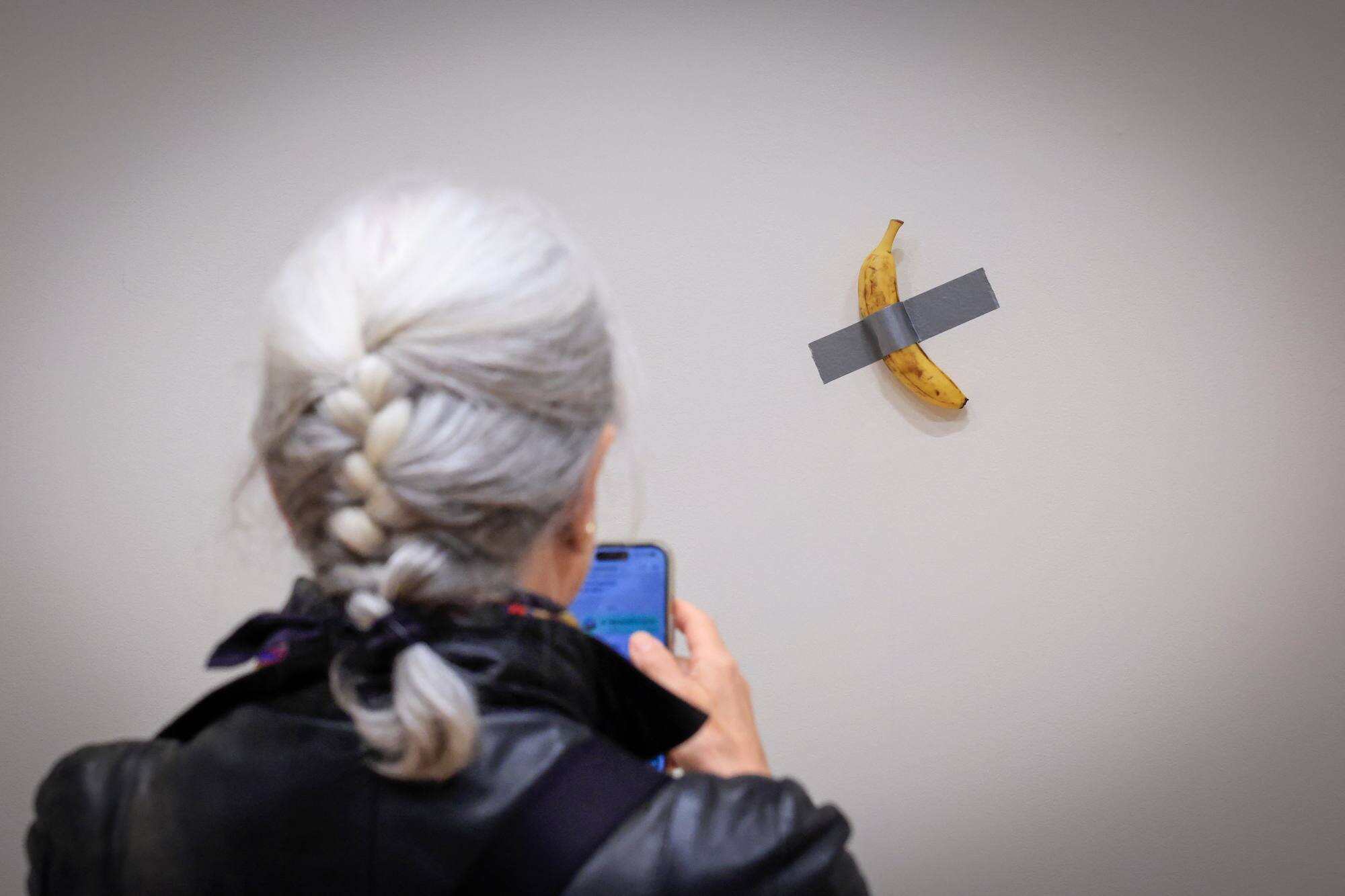 A Chinese cryptocurrency entrepreneur bought a banana taped to wall for US$6.2 million. Photo: AFP