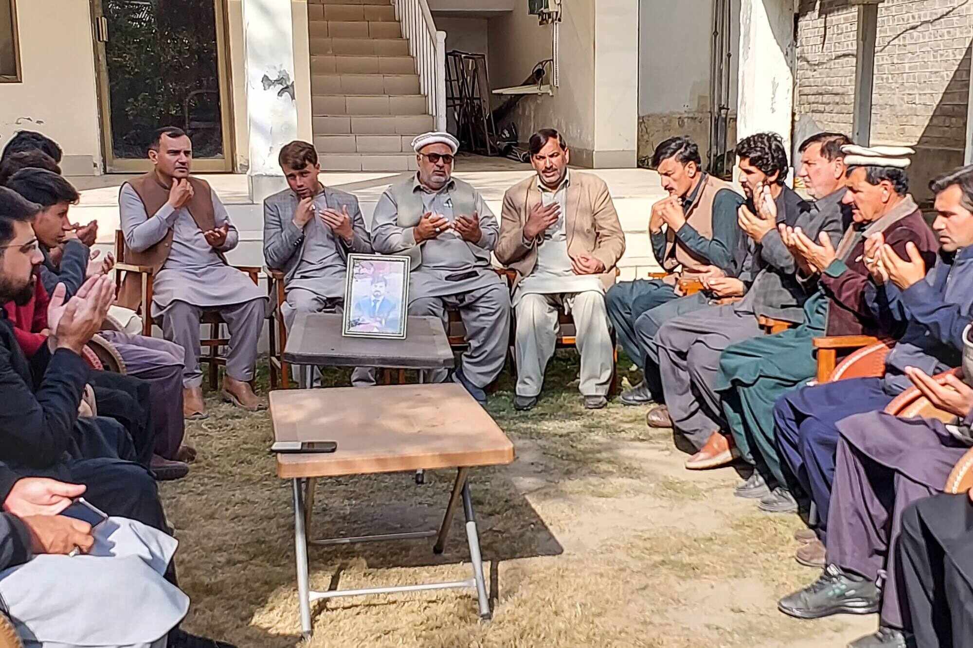 Local journalists pray for Janan Hussain, who was killed in sectarian attacks in Khyber Pakhtunkhwa, Pakistan. Photo: AFP