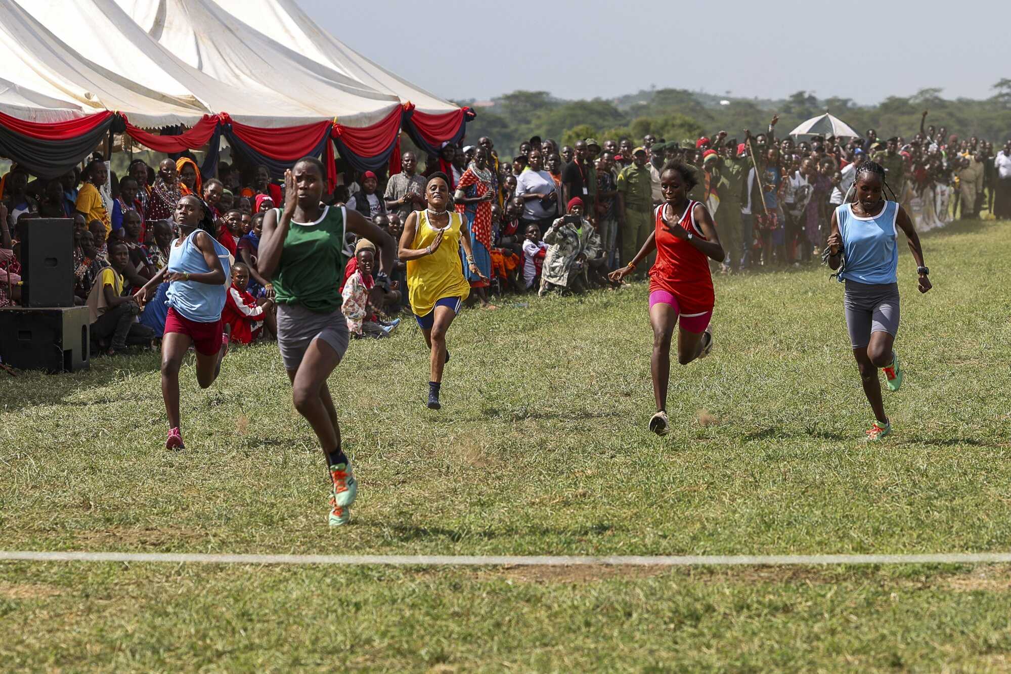 Maasai women compete in 100m race during the “Maasai Olympics 2024” held in the Kimana Sanctuary within the Amboseli-Tsavo Ecosystem, near Kenya’s border with Tanzania. Photo: EPA-EFE