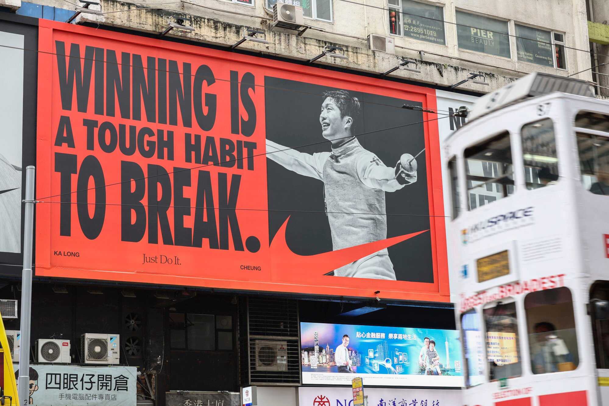 Hong Kong fencer and Olympic 2024 gold medalist Edgar Cheung Ka-long is seen on a Nike advertisement in Causeway Bay. Photo: Dickson Lee