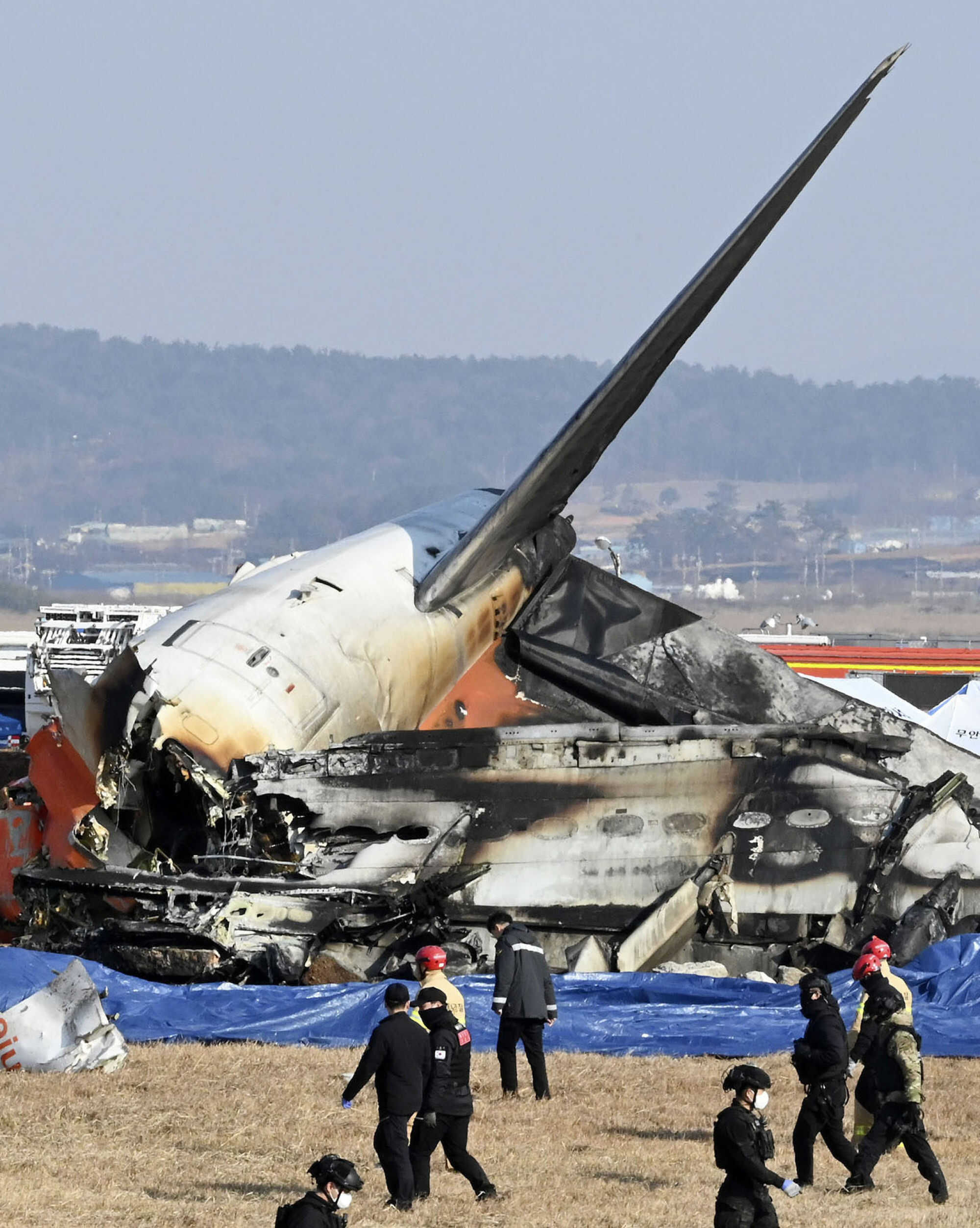The charred wreckage of the Jeju Air passenger plane that skidded off a runway and crashed into a wall at Muan International Airport in Muan County, South Korea. Photo: Kyodo