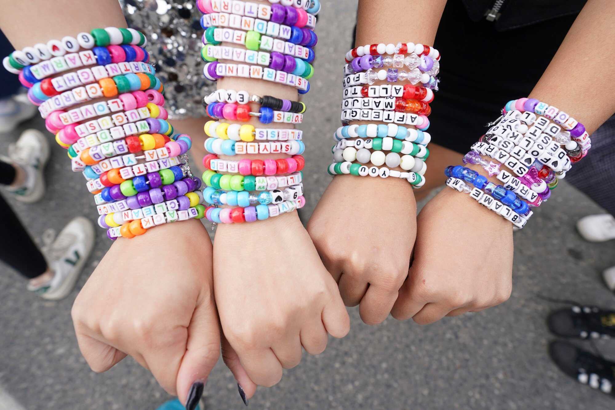 Taylor Swift fans display bracelets outside Toronto’s Rogers Centre before going to see Taylor Swift perform in Canada. Photo: AP