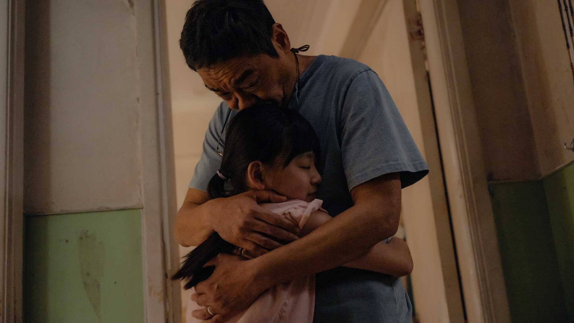 Sean Lau Ching-wan (top) and Lainey Hung in a still from “Papa”. Photo: Golden Scene