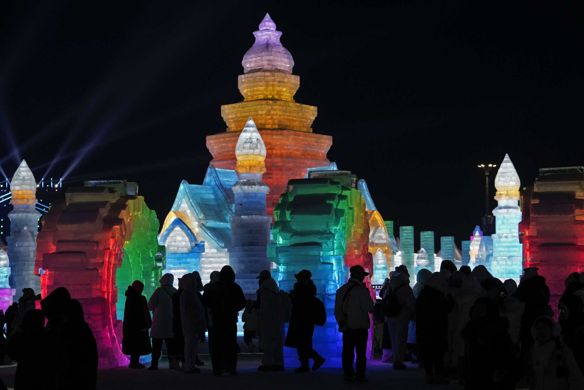 Illuminated ice structures at the Harbin Ice and Snow World in Harbin, China. Photo: AP Photo