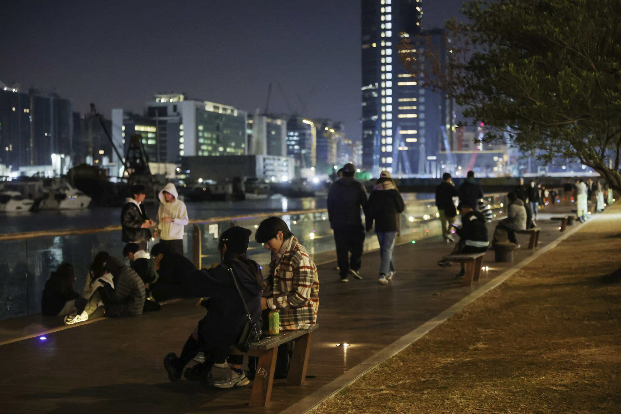 Kwun Tong Promenade is a popular spot for young people to hang out with friends. Photo: Edmond So