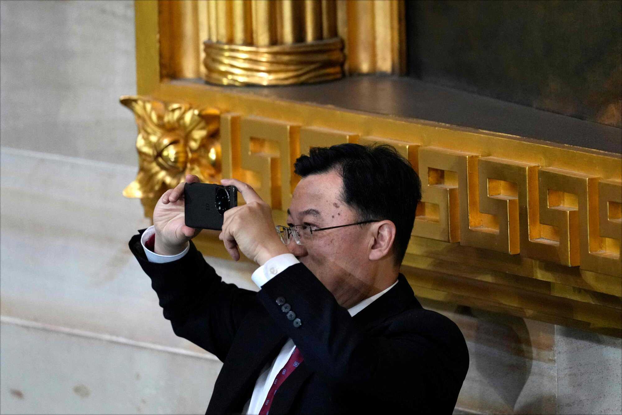 Xie Feng, Chinas ambassador to the United States, takes a picture during US President Trump’s 2025 inauguration in Washington, US. Photo: AFP