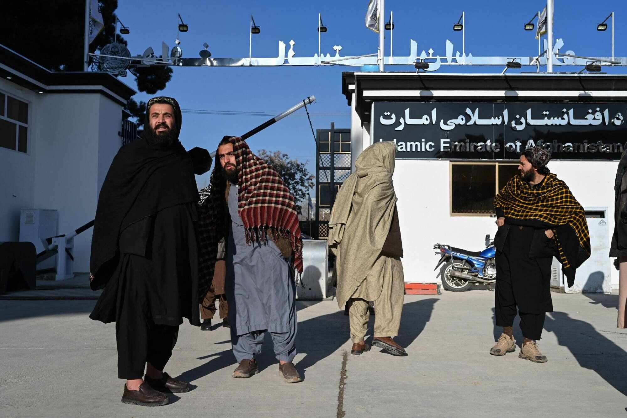 Taliban security personnel stand guard at a newly built gate after the reopening of a blocked road leading to the former US embassy in Kabul on January 12, 2025. Photo: AFP