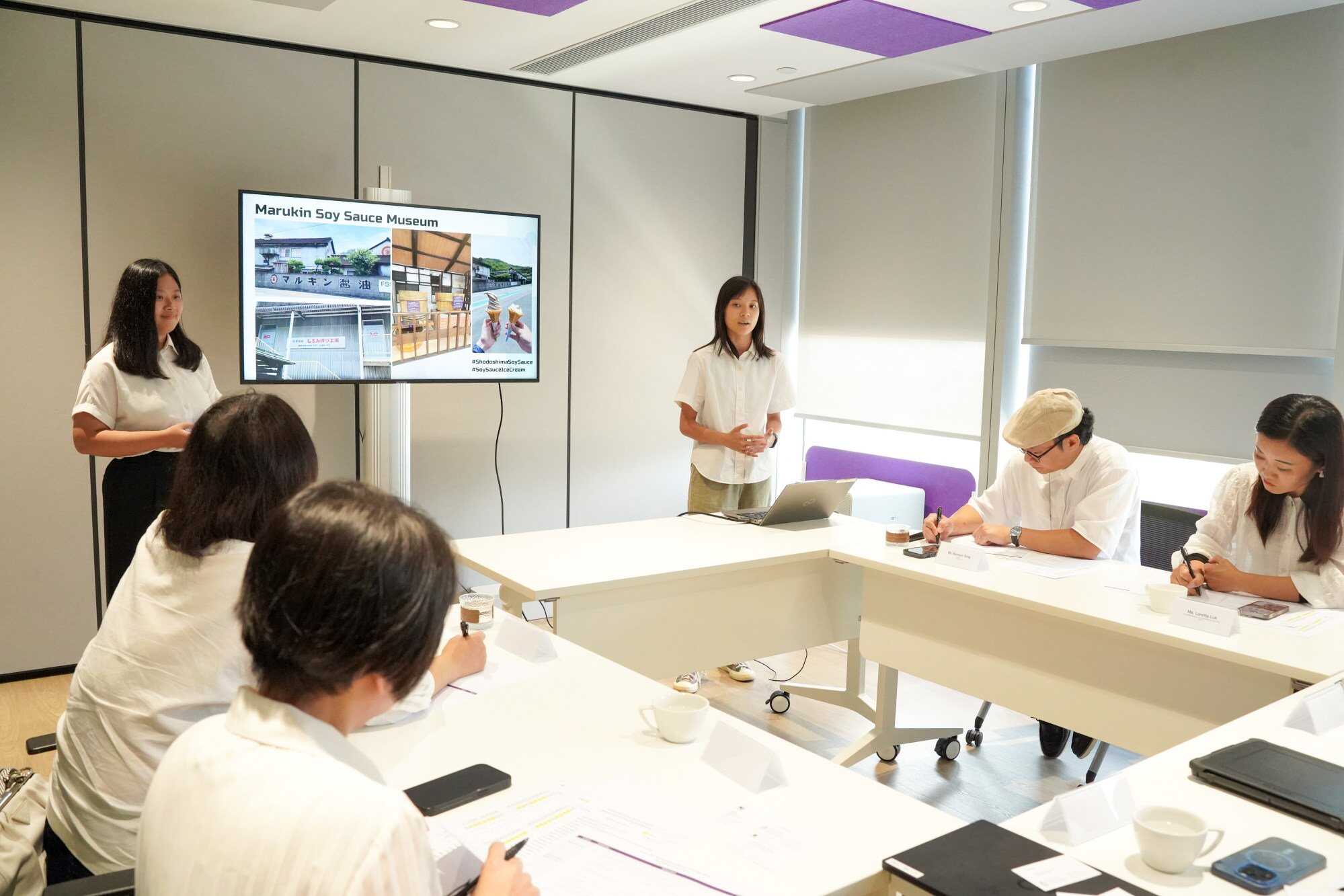 Crystal Leung Mei-ki and Opal Ho Ka-wai present their itinerary. They said the challenge allowed them to put sustainability into practice. Photo: Handout