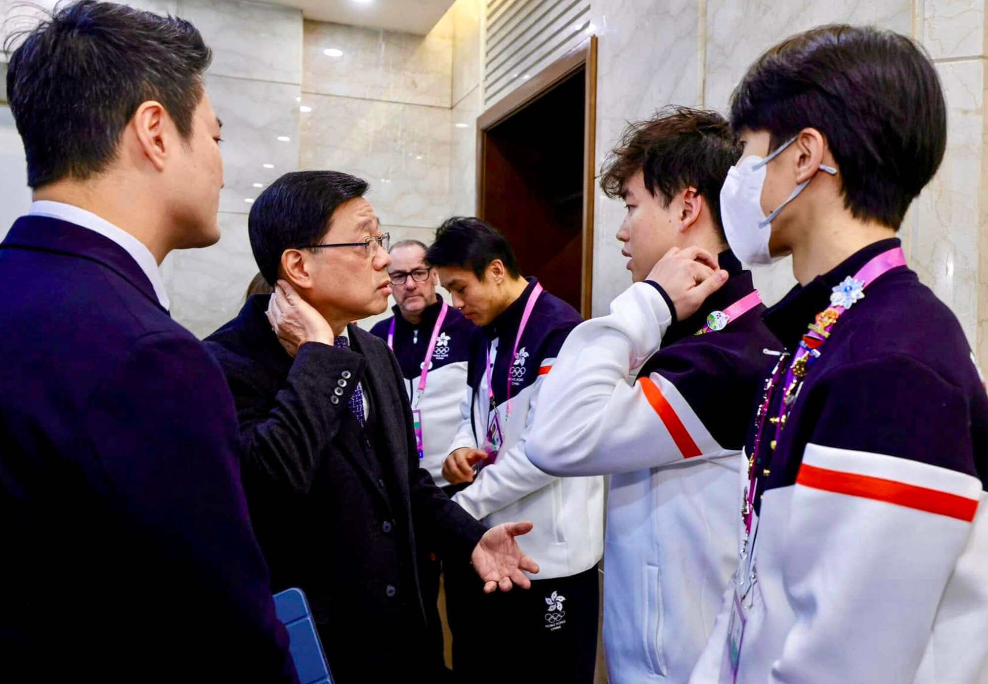 Hong Kong Chief Executive John Lee Ka-chiu visited the injured hockey players. Photo: Handout