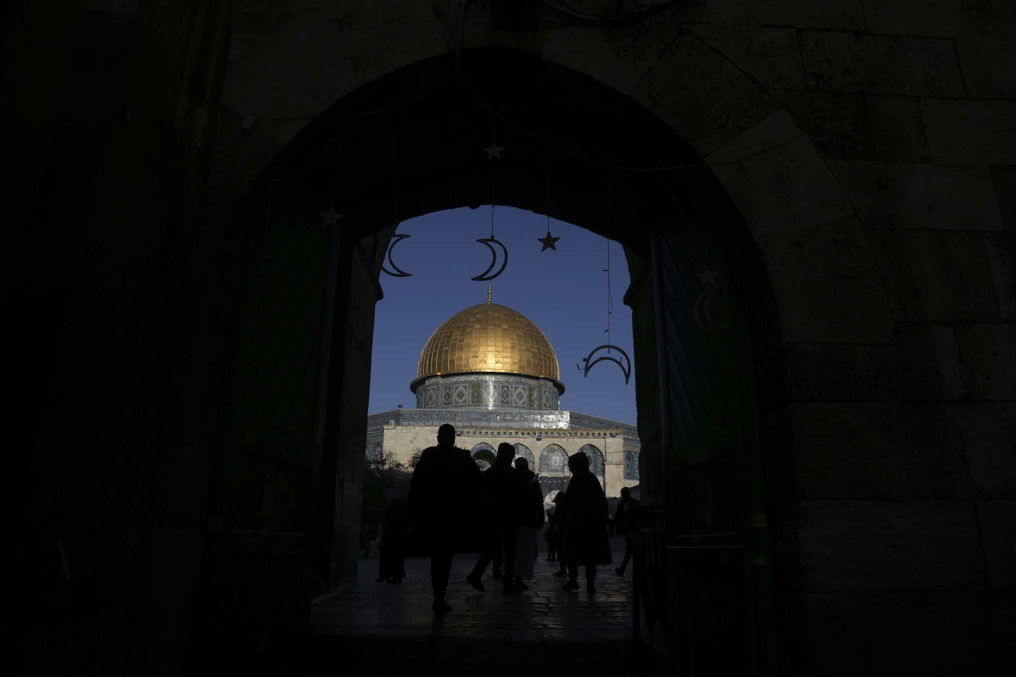 Muslim worshippers gather at the Dome of the Rock Mosque in the Al-Aqsa Mosque compound ahead of the start of the Islamic holy month of Ramadan in Jerusalem. Photo: AP
