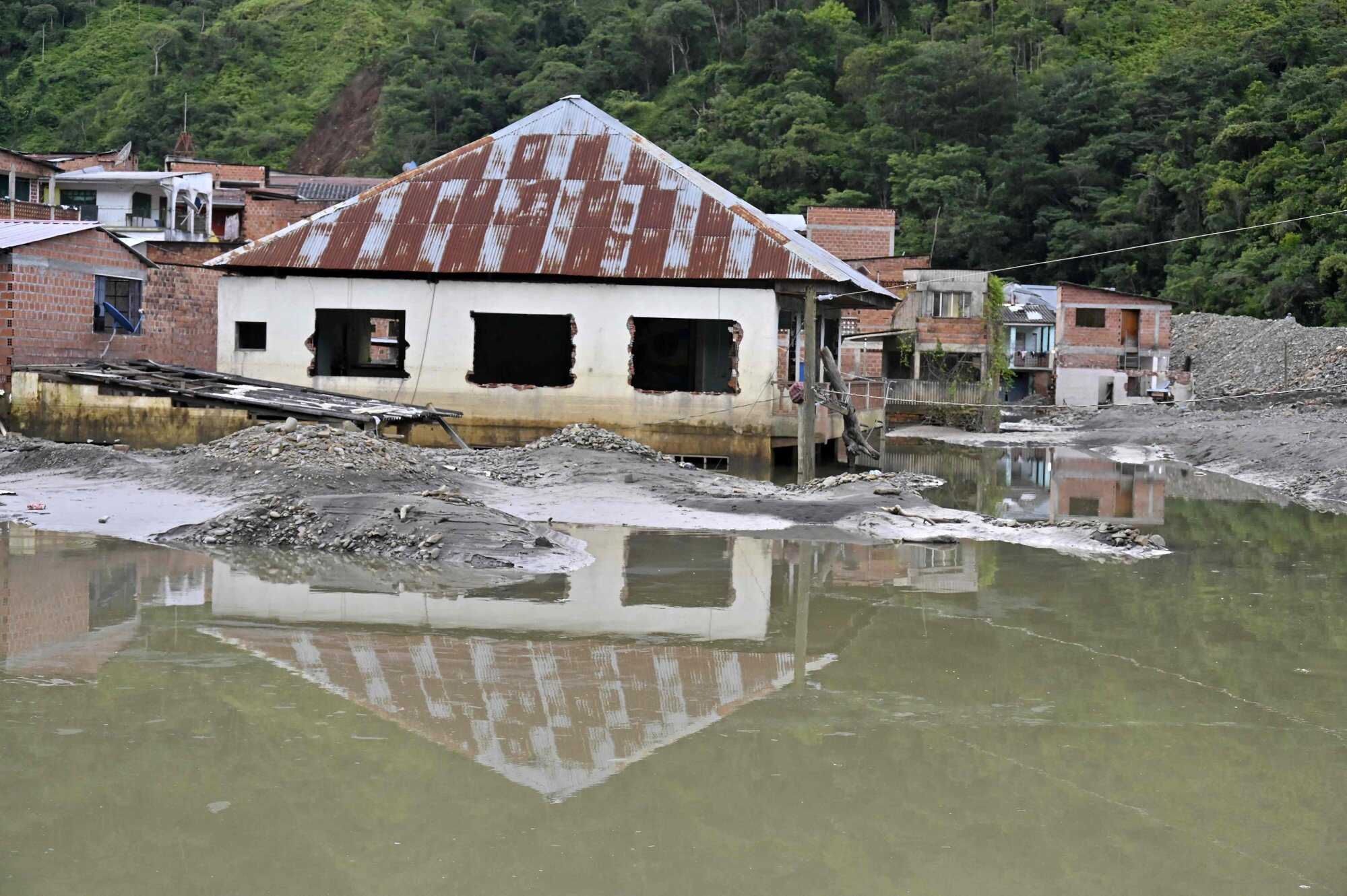 A flooded street is pictured in the town of Chima after heavy rains in the northern La Paz department, Bolivia, on March 12, 2025. Photo: AFP