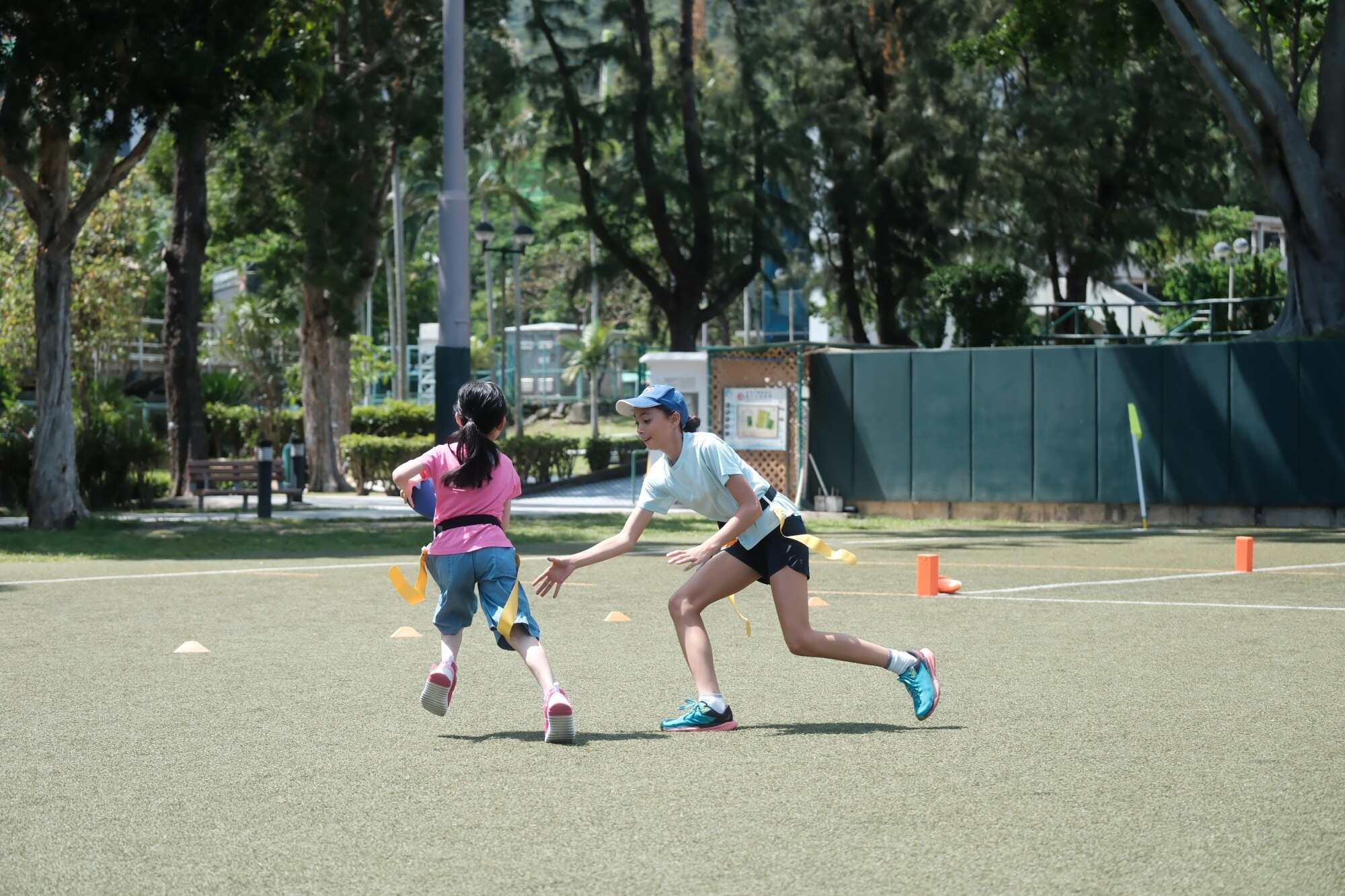 Annabel Chow (right) hopes more girls can join flag football. Photo: Handout