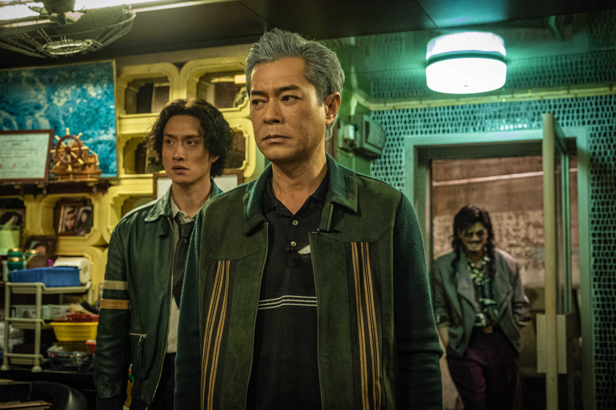 (From left) Terrance Lau Chun-him, Louis Koo Tin-lok and Philip Ng Wan-lung in a still from “Twilight of the Warriors: Walled In”. Photo: Handout