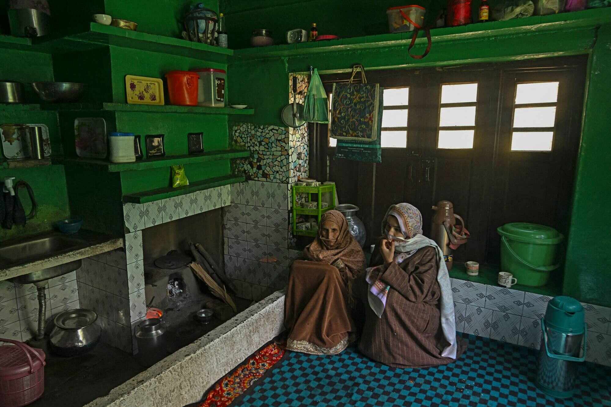 Baby Jan (left) and Asmat Jan (right), the mother and sister of Syed Adil Shah. Photo: AFP