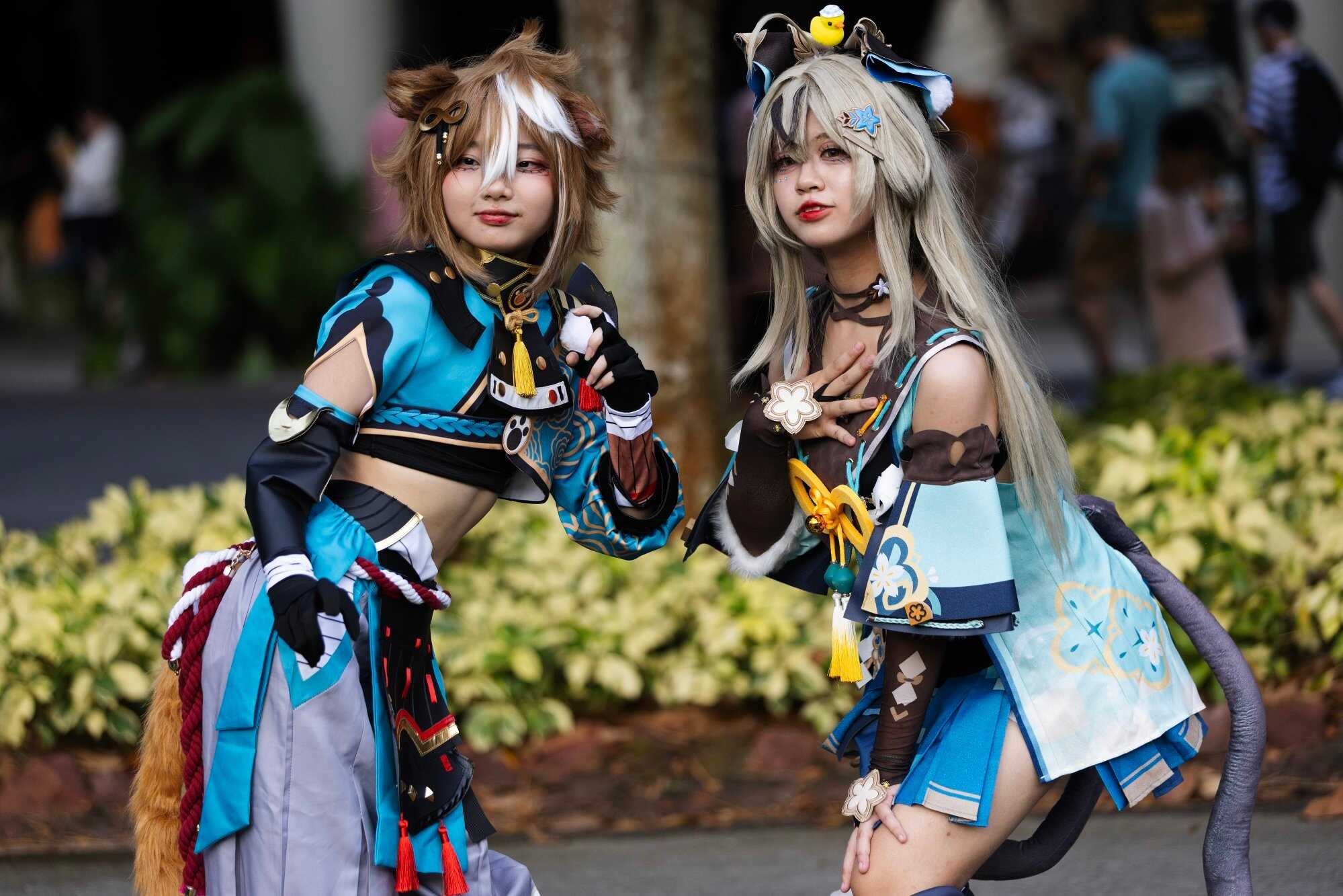 Anime cosplay enthusiasts pose for photos during the Sakura: Anime Garden 2024 event in Singapore. Photo: EPA-EFE