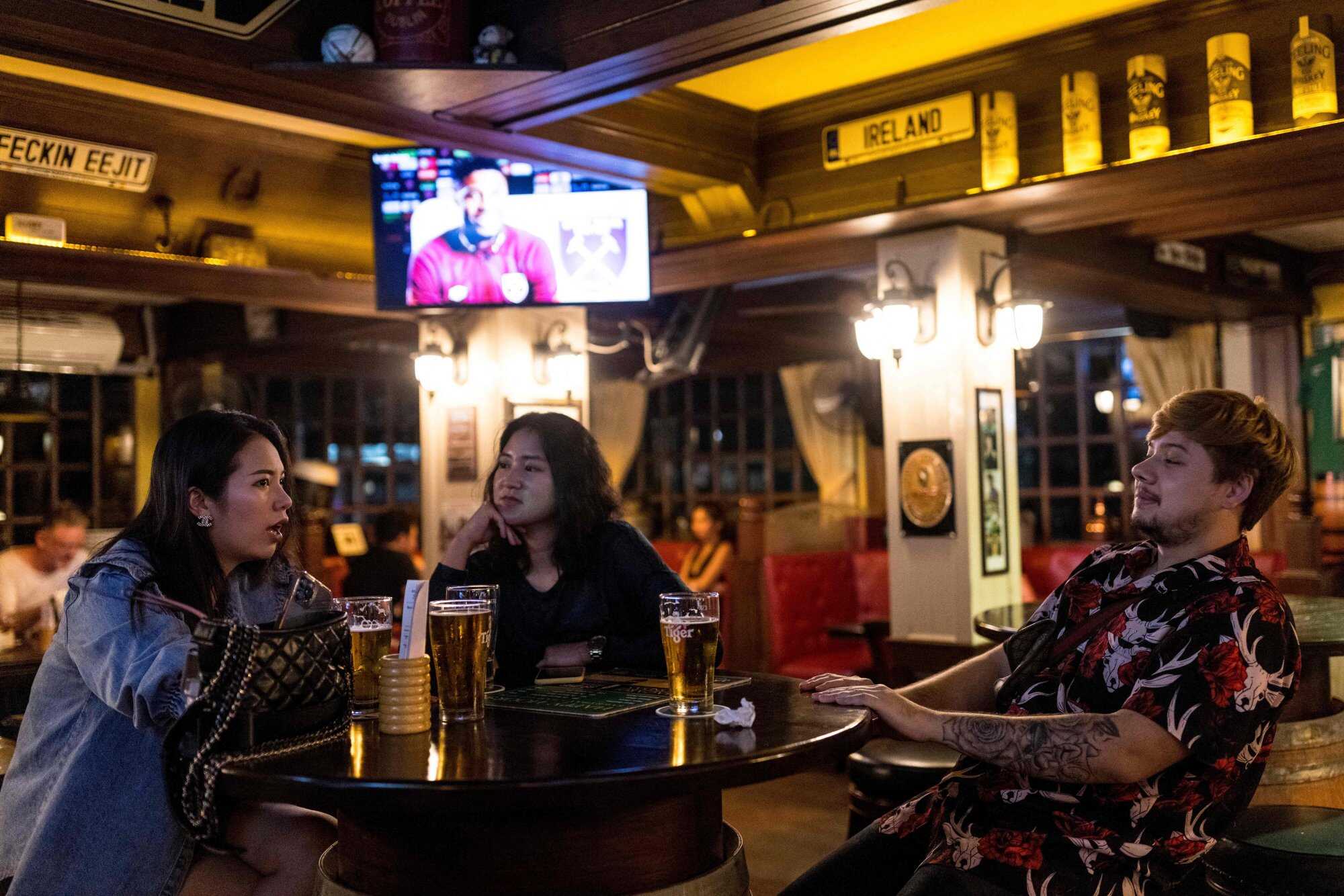 Some Thai teachers are protesting a deal with a beer company, claiming that it undermines educational integrity and could damage the public image of teachers. Photo: AFP