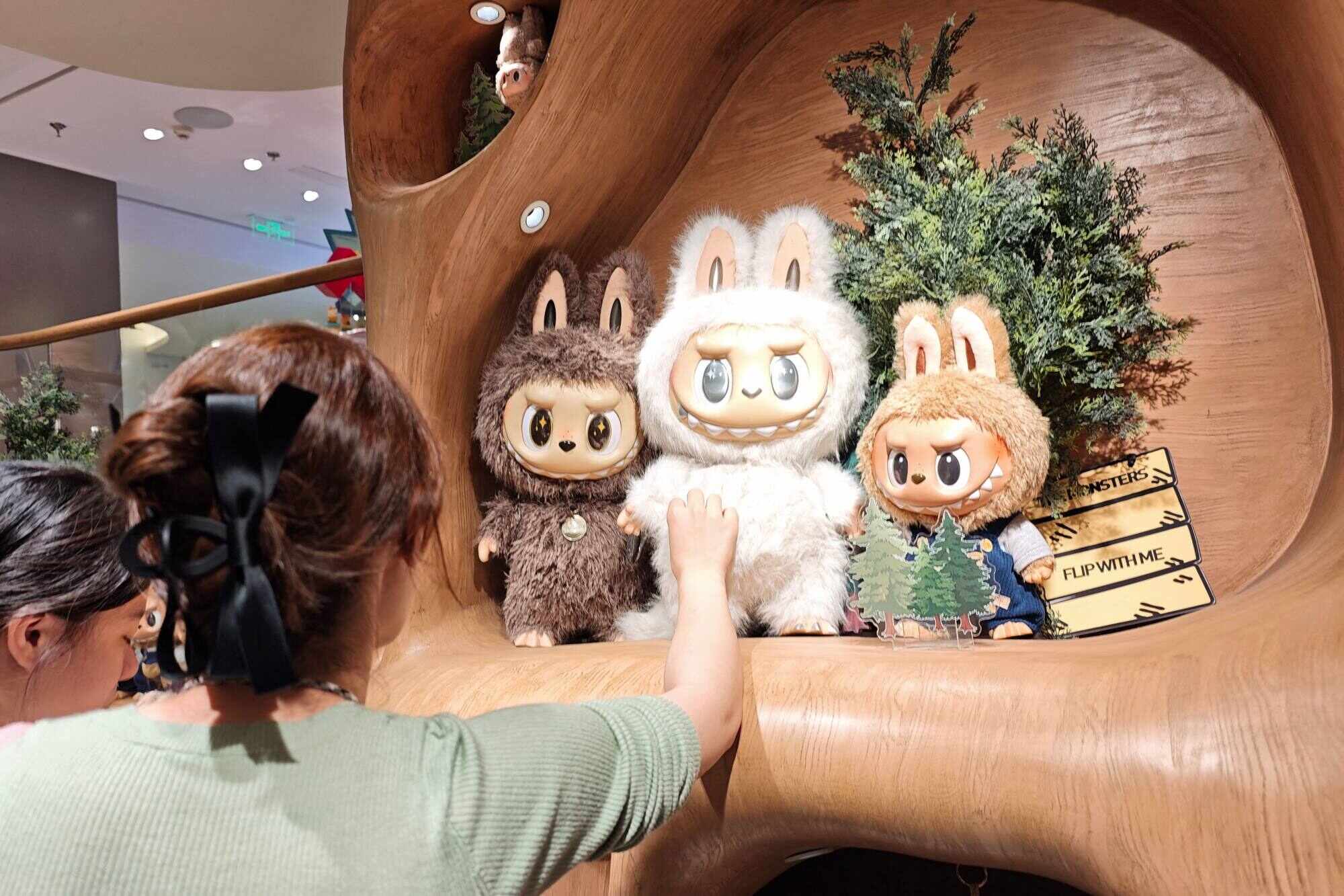 Labubu, Pop Mart’s cute collectible, is captivating global fans, boosting sales and sparking comparisons to Hello Kitty with its universal appeal. Photo: AFP