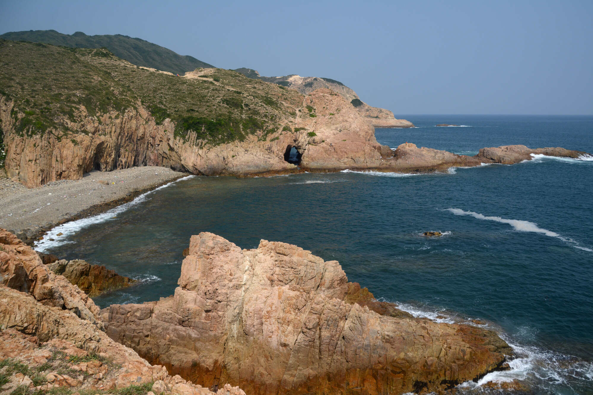 The rocky coastline of Hong Kong Unesco Global Geopark with the iconic Mok Min Cave. Photo: Getty Images