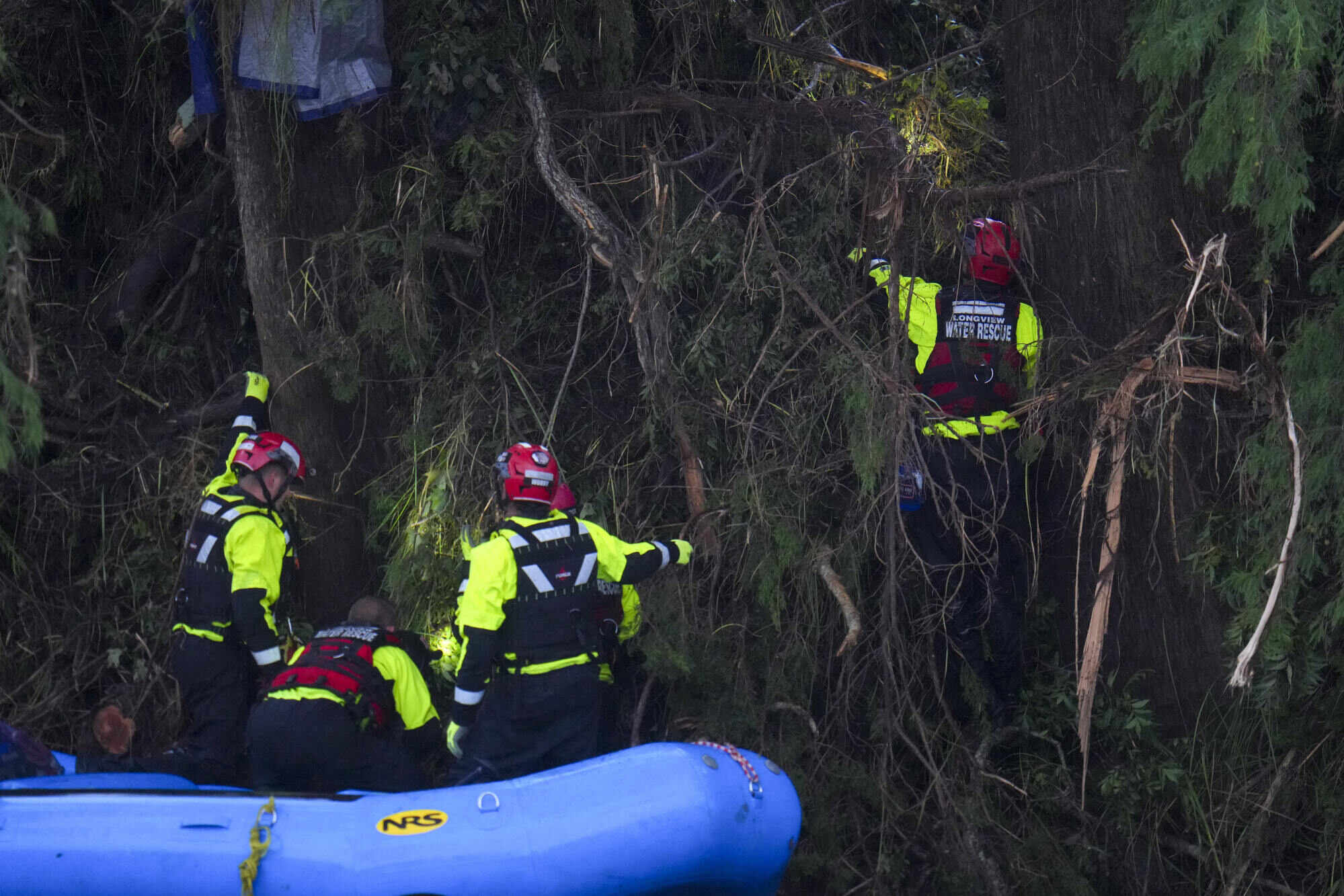 Officials assist with a recovery effort at Camp Mystic along the Guadalupe River on July 6, 2025. About 10 children staying at the camp were still missing as of July 7. Photo: AP