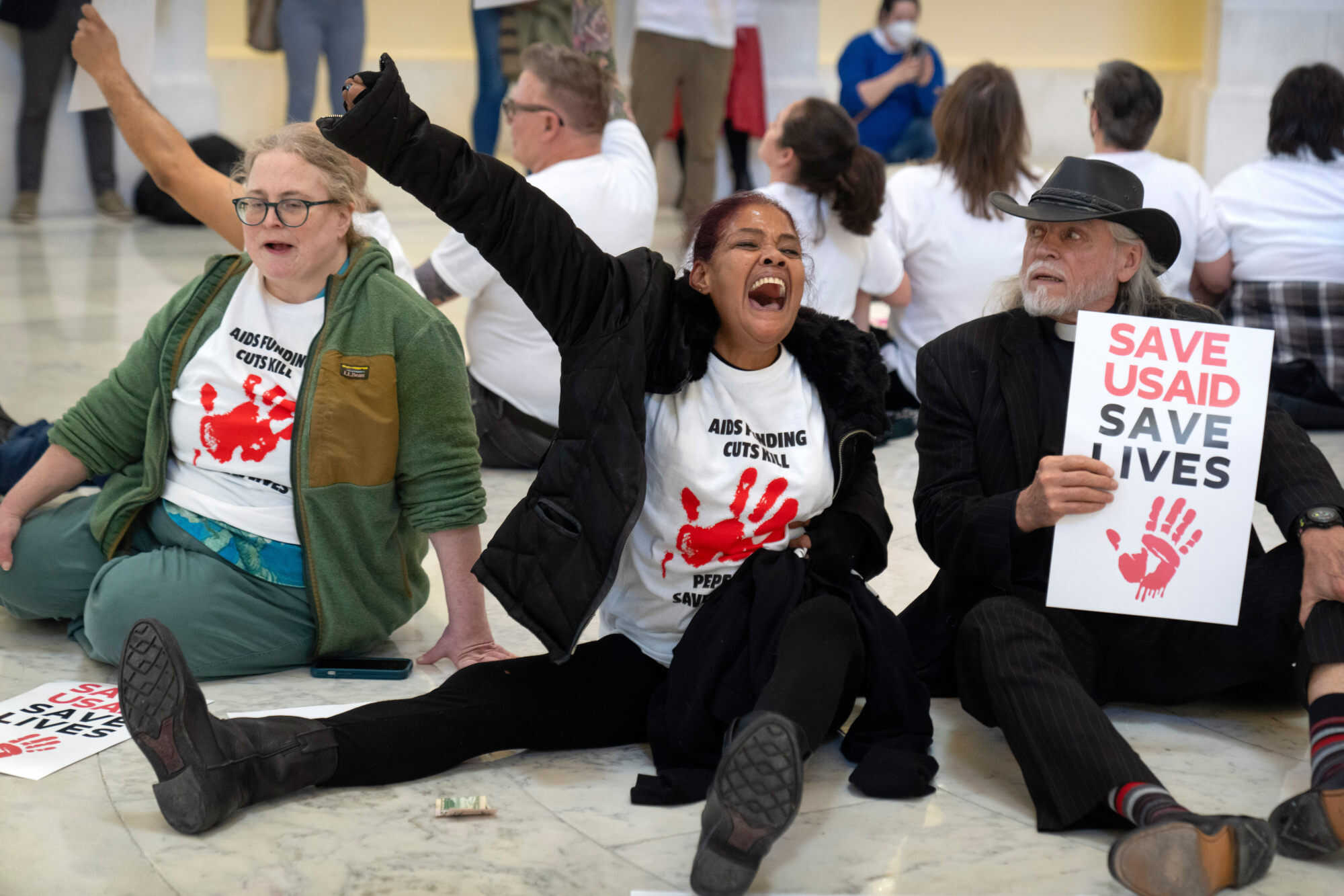 Demonstrators protest against cuts to American foreign aid spending, including USAID and the PEPFAR programme to combat HIV/Aids in Washington earlier this year. Photo: AP