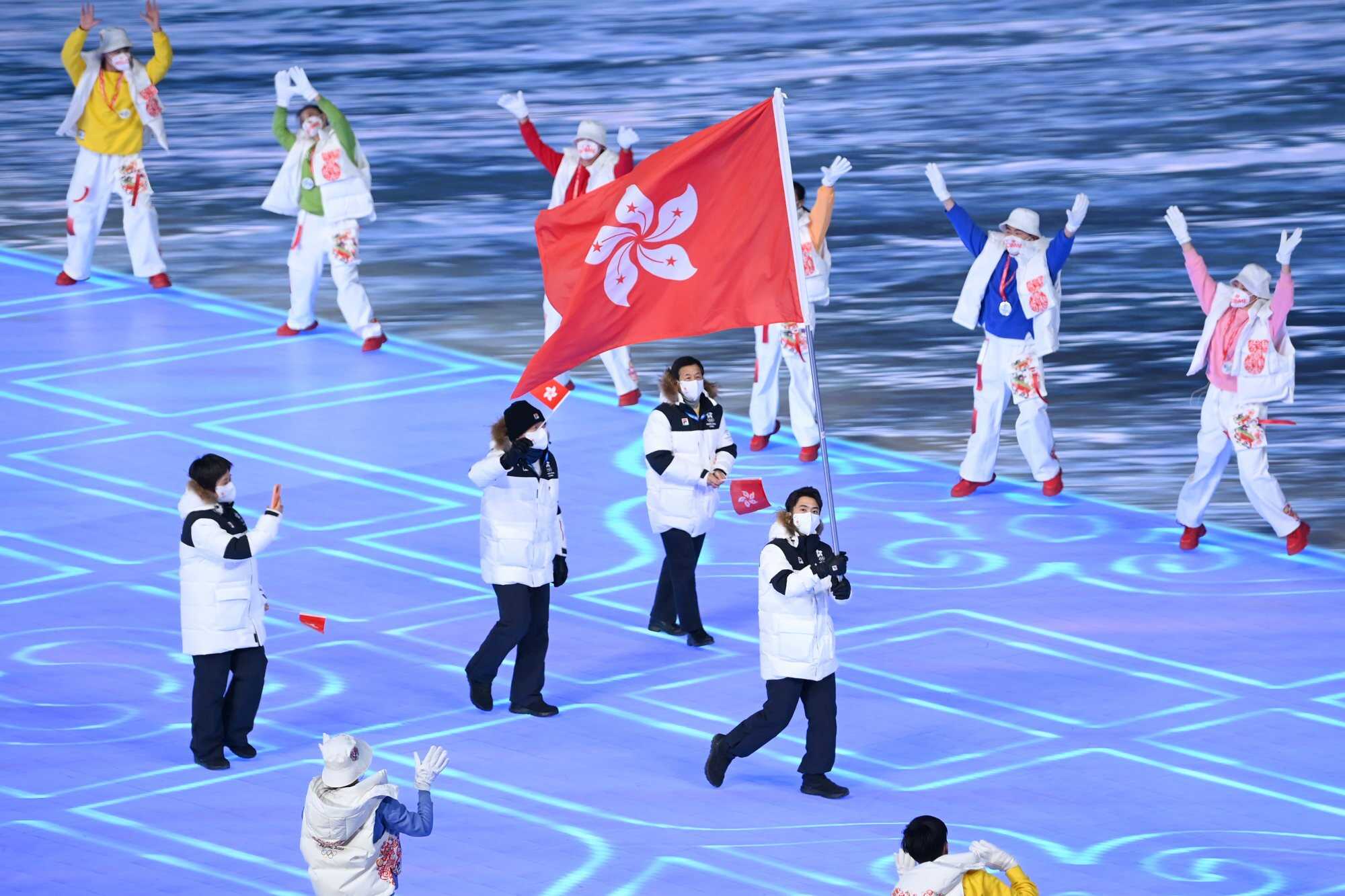 Sidney Chu waves the Hong Kong flag during the opening ceremony of the Beijing 2022 Winter Olympics. Photo: Getty Images