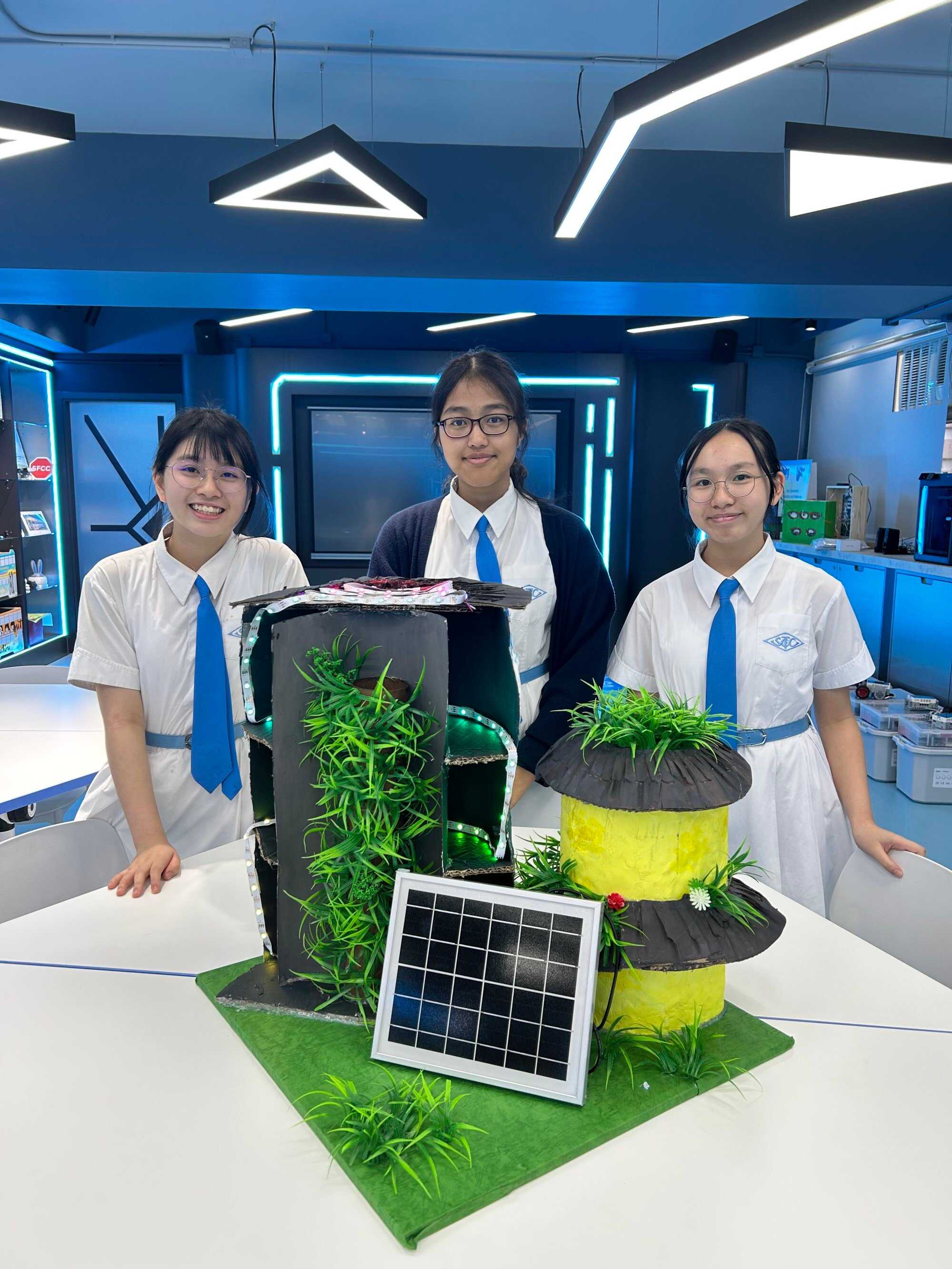 The team from St Francis’ Canossian College poses with their design. Photo: Handout