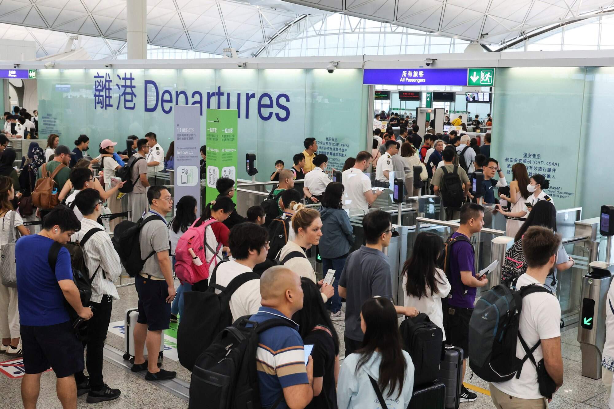 Passengers arrive at the Hong Kong International Airport’s departure hall after flights resumed following Typhoon Wipha. Photo: Dickson Lee