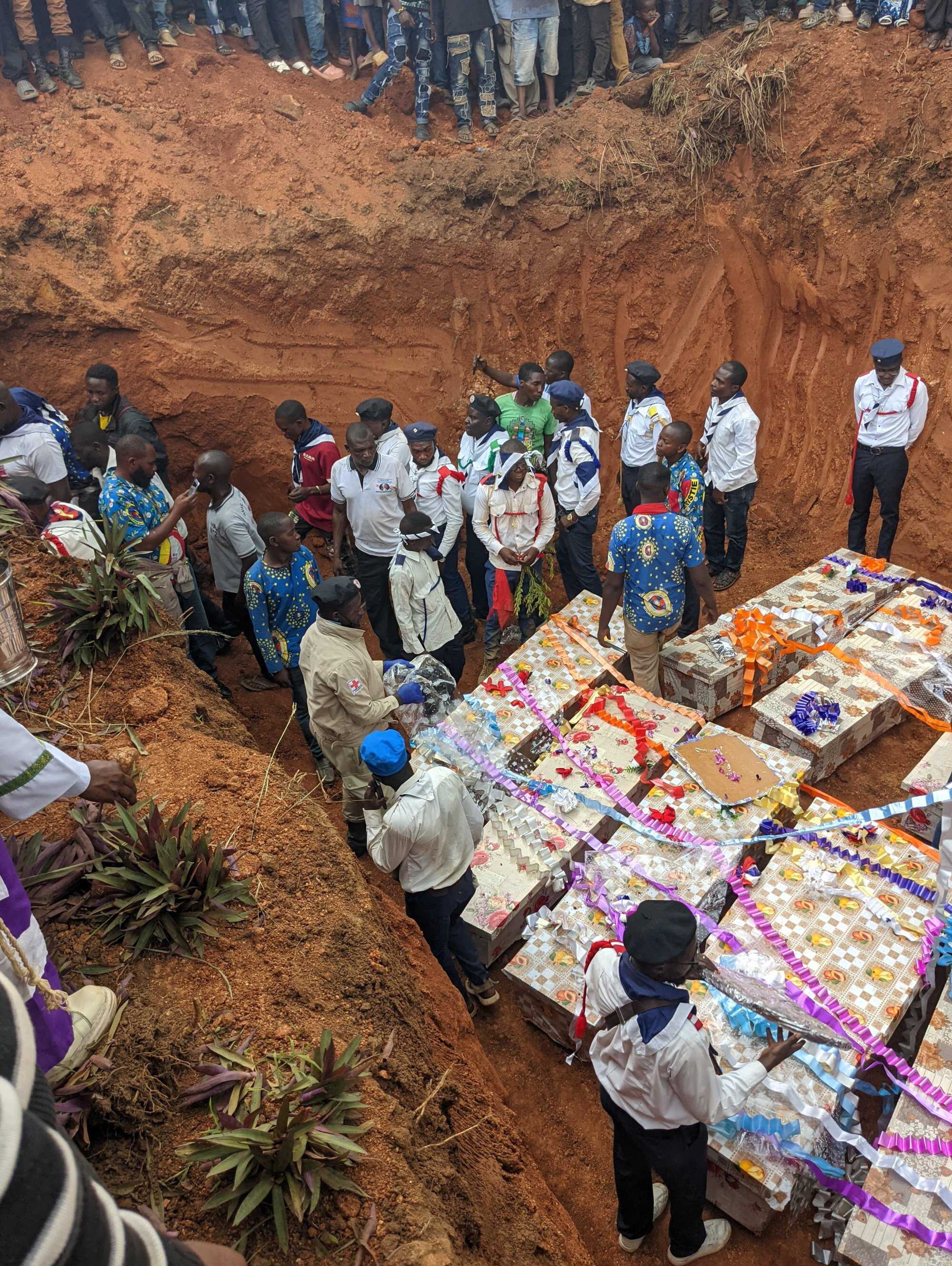 Civilians bury the remains of people killed in an attack carried out by Islamic State-affiliated Allied Democratic Forces (ADF) at a church in Komanda, near Ituri’s provincial capital of Bunia, northeastern Democratic Republic of Congo. Photo: Reuters