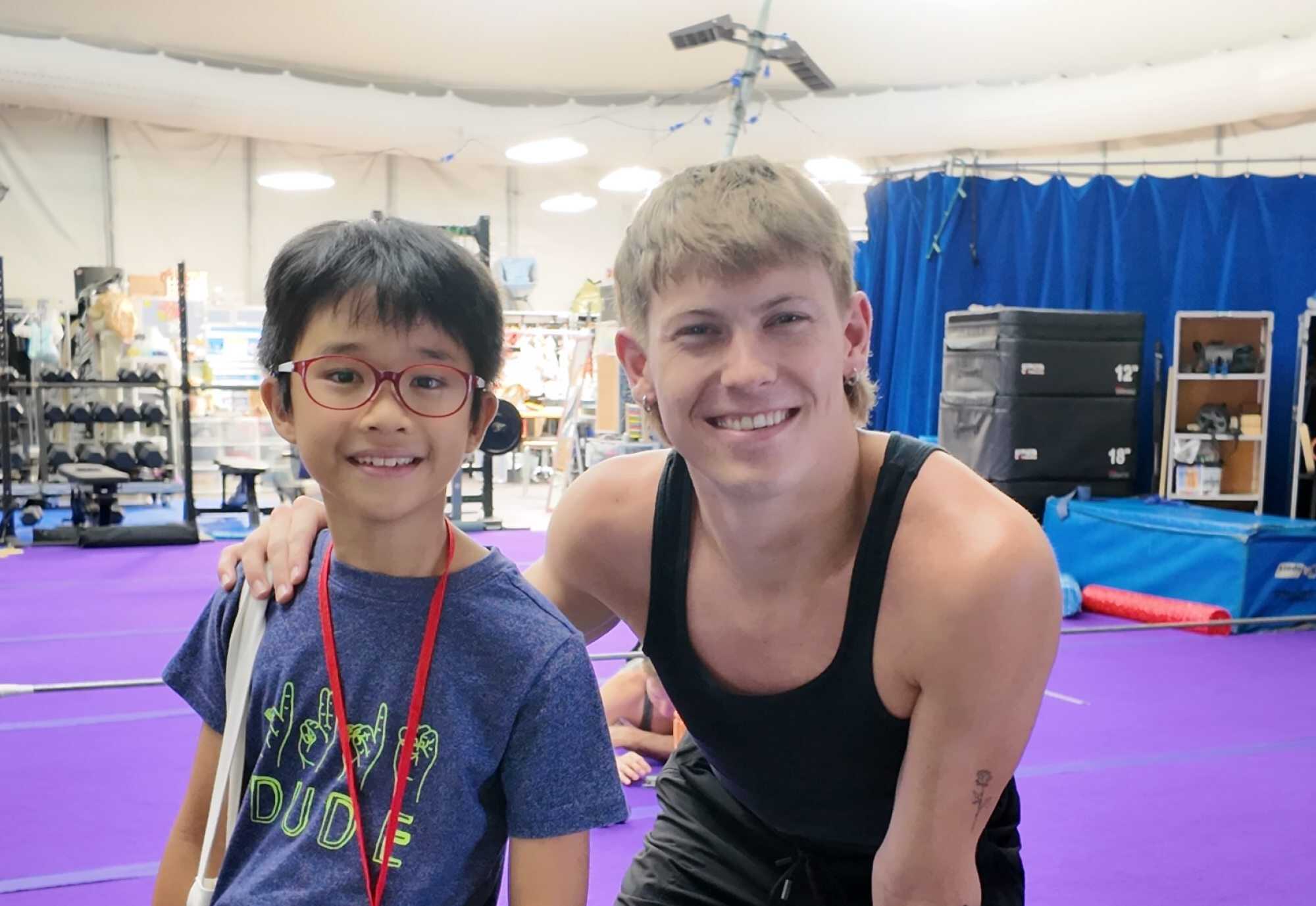 Gabriel Julien Ling, pictured here with the performer who plays the trickster after the show.