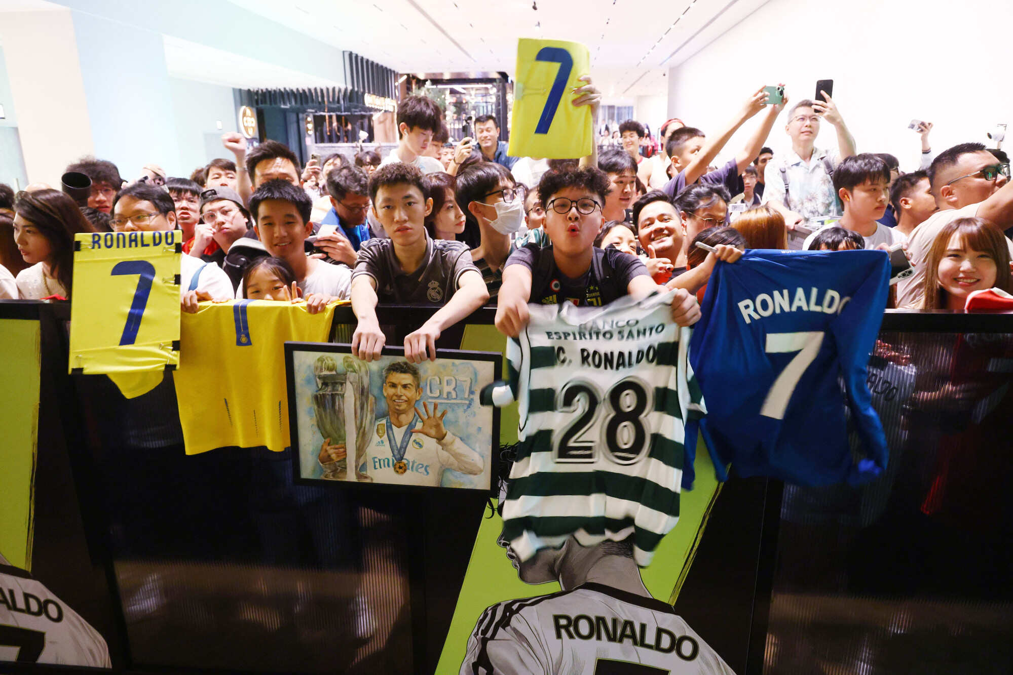 Fans waited for hours outside CR7 Life Museum in the K11 Musea shopping centre in Tsim Sha Tsui to catch a glimpse of Cristiano Ronaldo. Photo: Dickson Lee