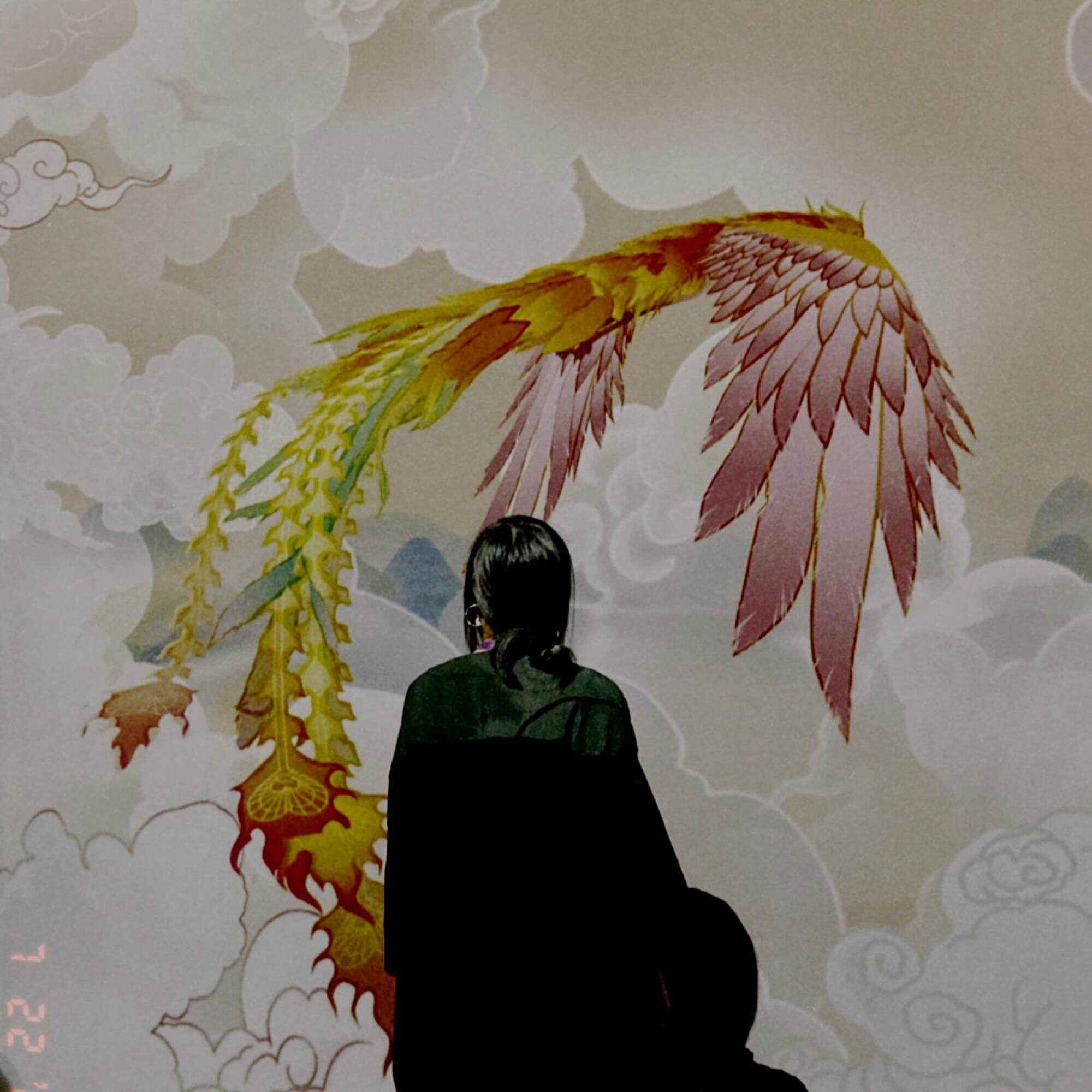 A phoenix flies through the clouds, showing the motifs and patterns often used in Chinese art. Photo: Tamia Fung Hui-ching