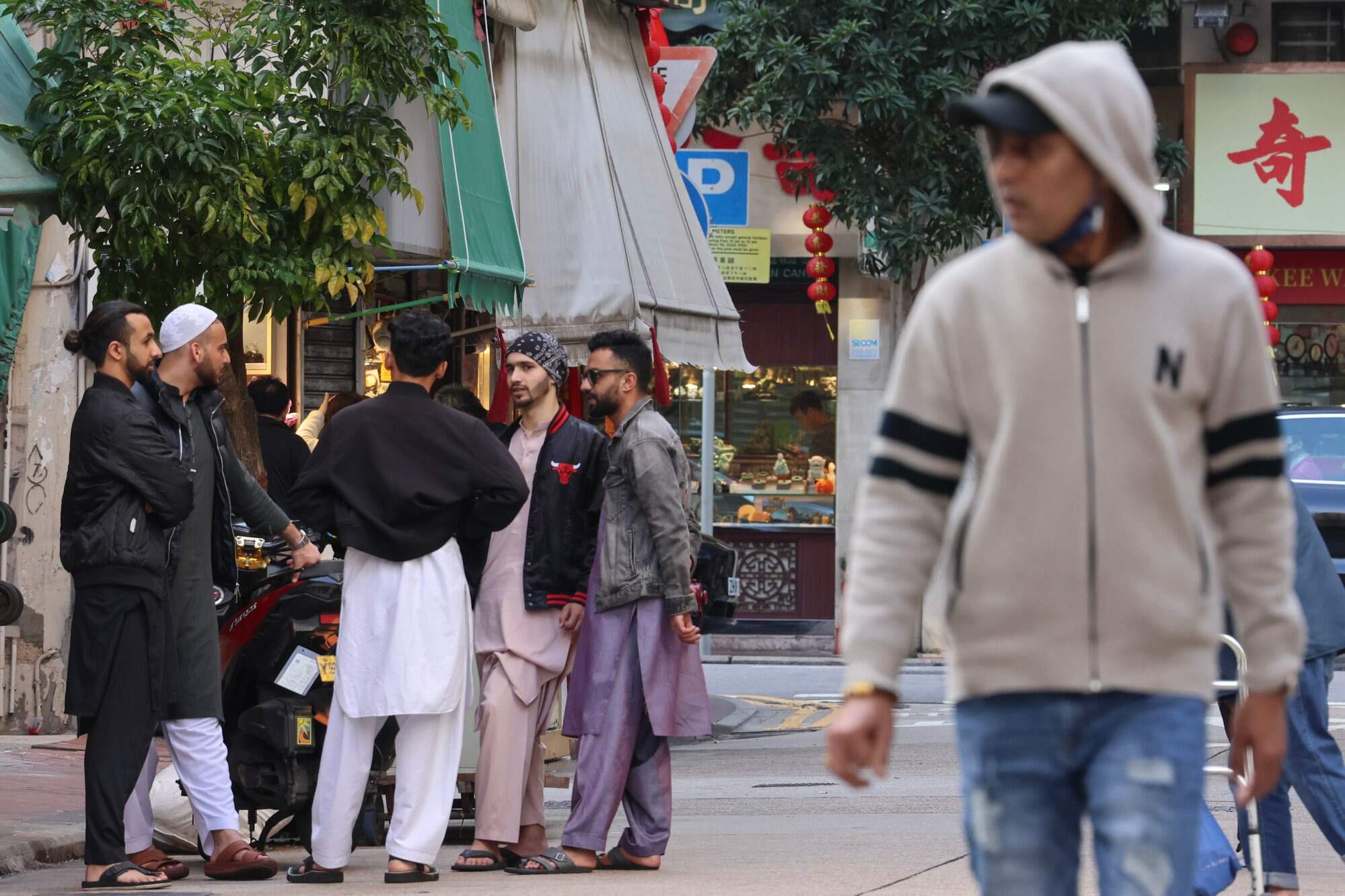 Men gather in Yau Ma Tei. In early 2025, the NGO Hong Kong Unison disbanded after 24 years of advocating for the rights of the city’s ethnic minority groups. Photo: Jelly Tse