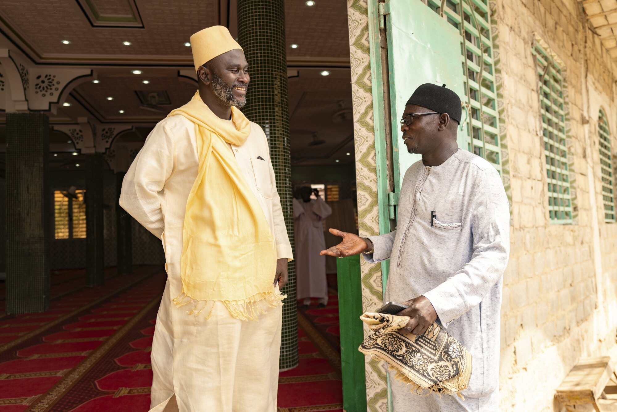 Imam Ibrahima Diane (left) with El Hadj Malick, a coordinator of the programme. The programme launched in Senegal in 2011, but in recent years has caught the attention of the Ministry of Women, Family, Gender and Child Protection. Photo: AP