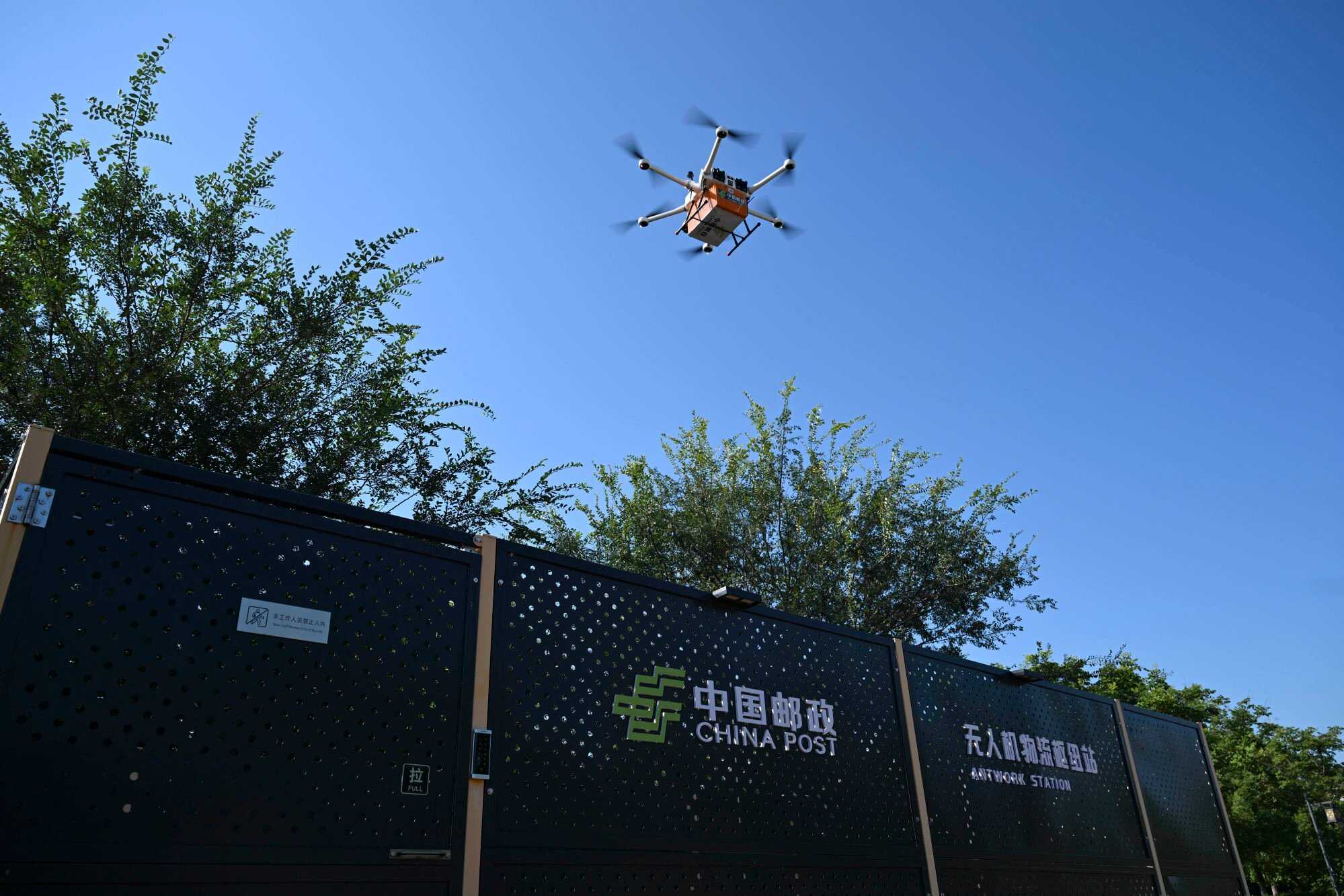 A drone takes off to deliver a parcel at a station in Chaohu, Hefei city, in China’s eastern Anhui province. Photo: Xinhua