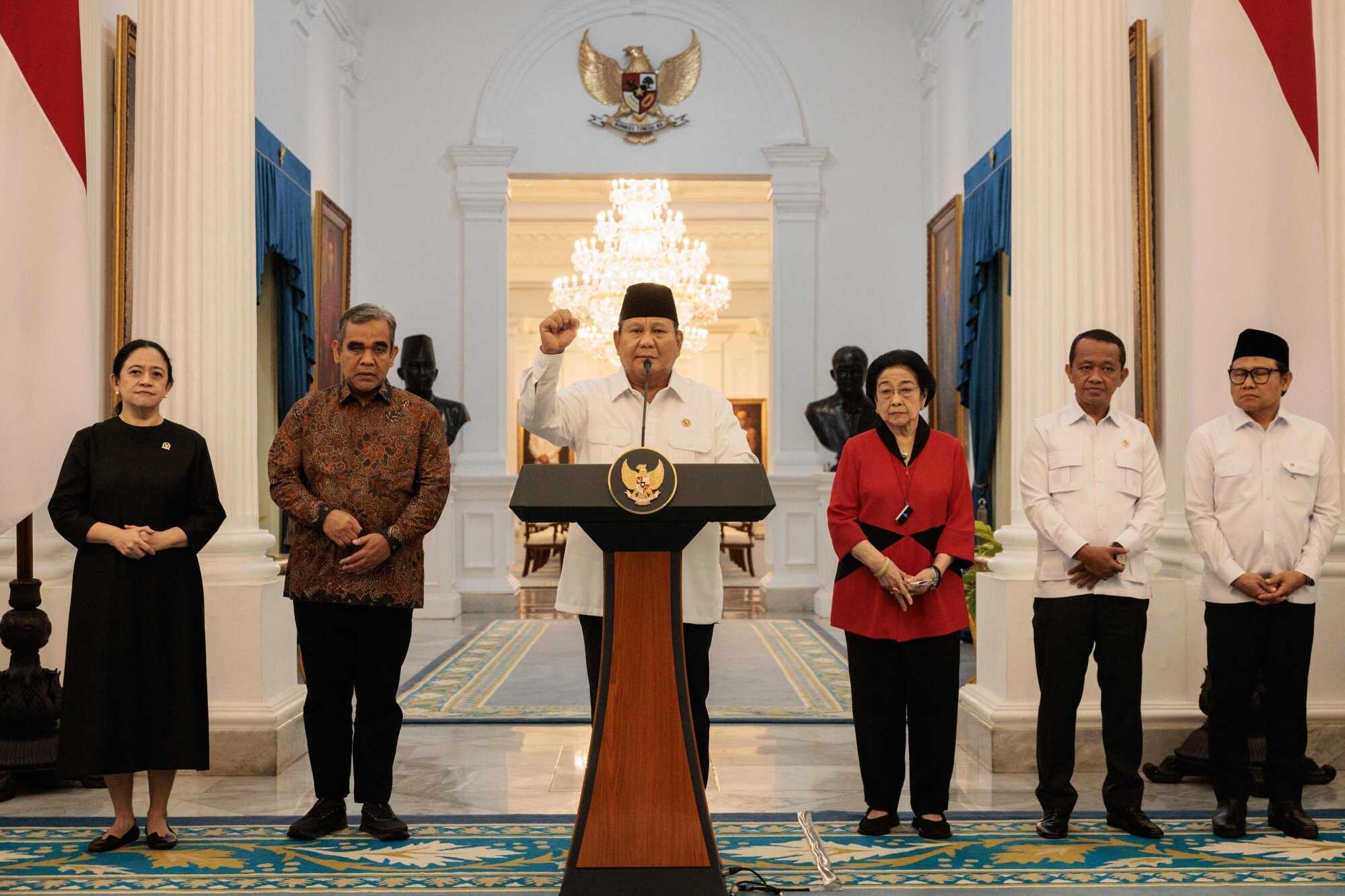 Indonesia’s President Prabowo Subianto (centre) alongside political party leaders at the Presidential Palace in Jakarta. Photo: AFP