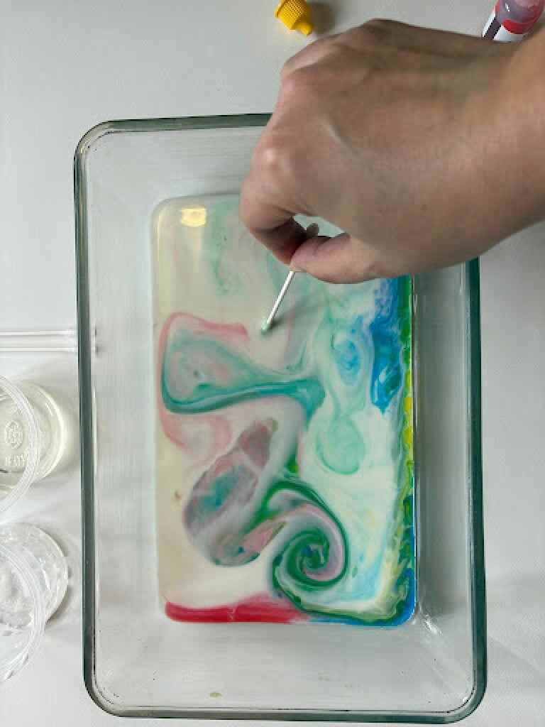 Dishwashing soap “magically” moves the milk. Photo: Handout